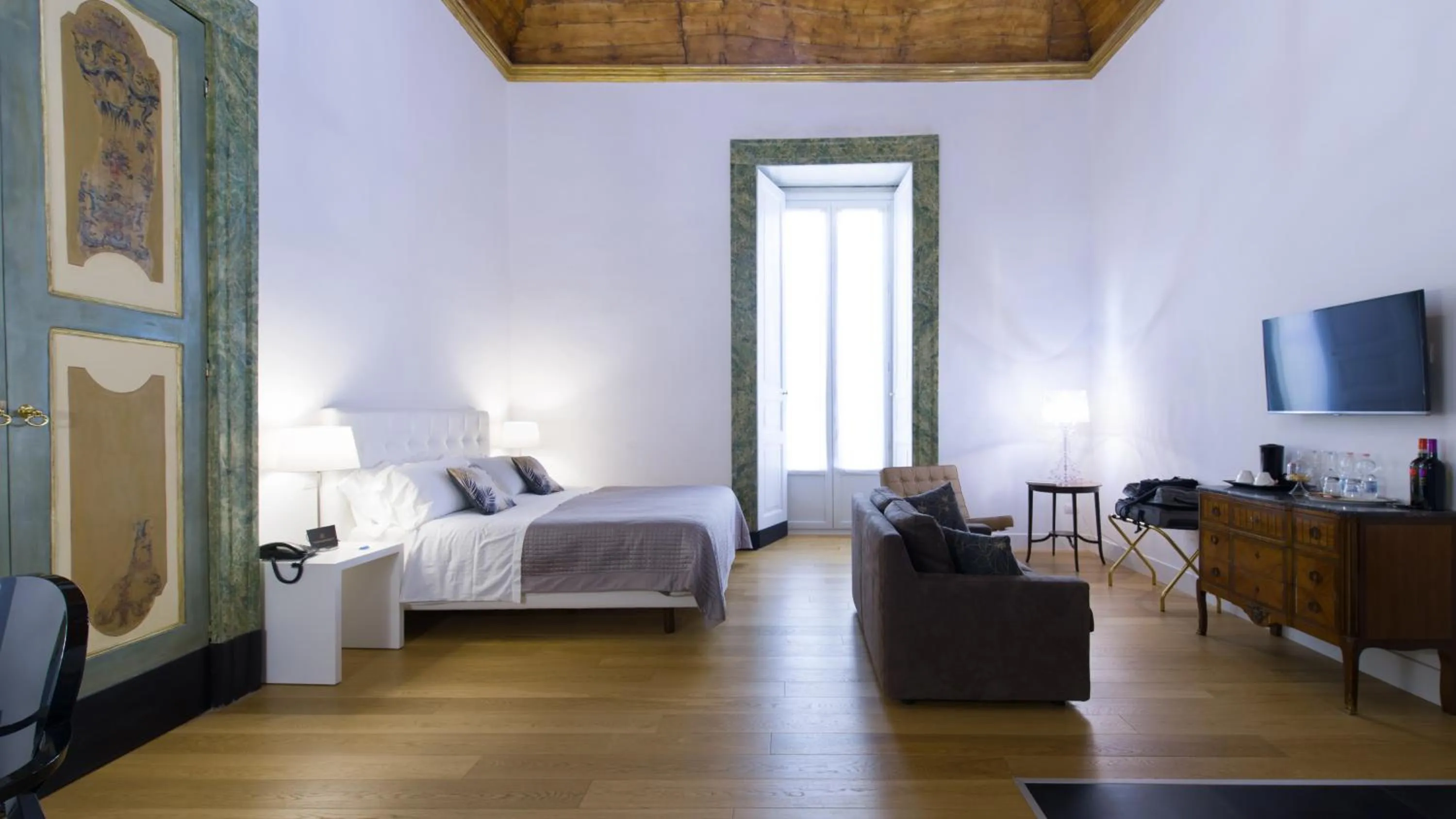 Bed in Santa Chiara Boutique Hotel