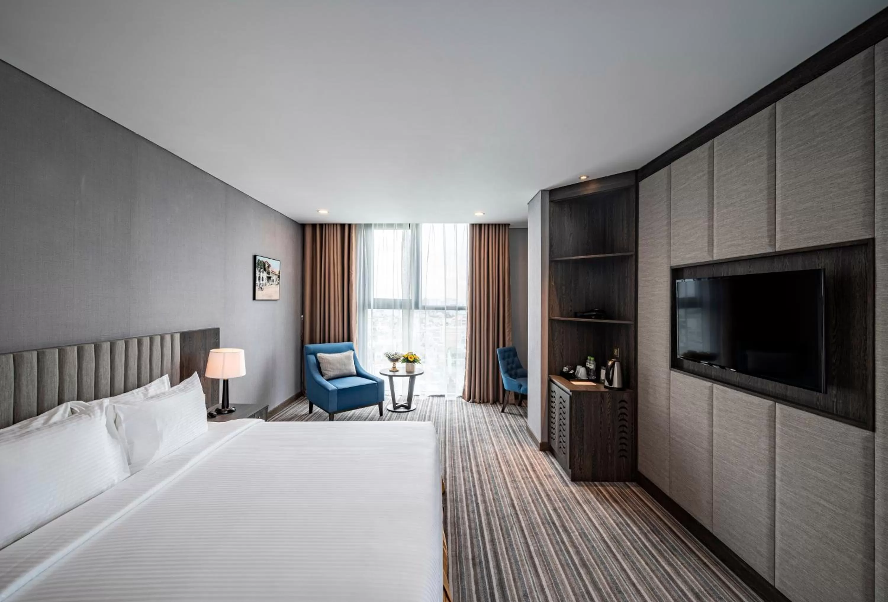 Photo of the whole room, Bed in Muong Thanh Luxury Saigon Hotel