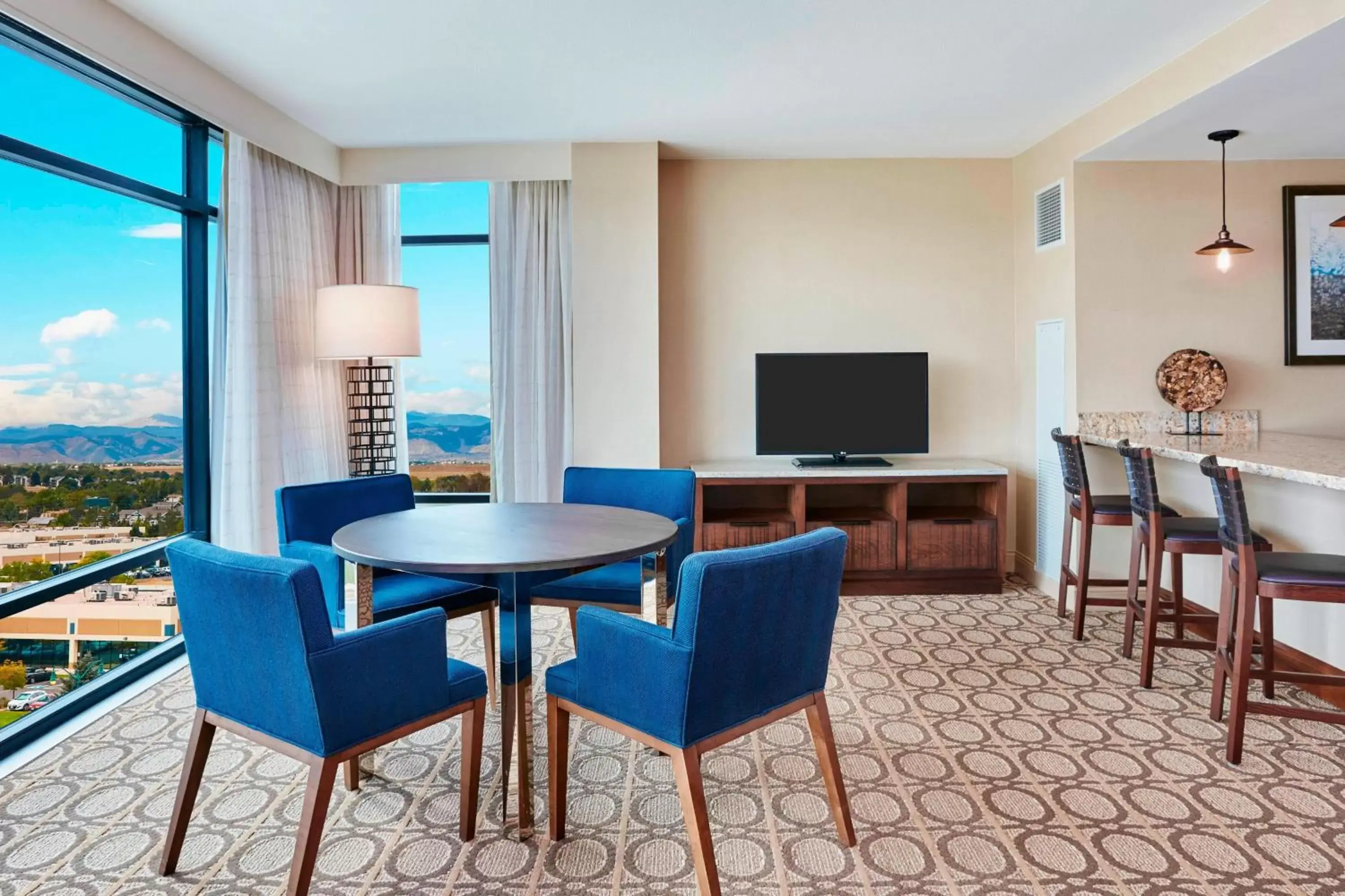 Living room, Dining Area in Denver Marriott Westminster