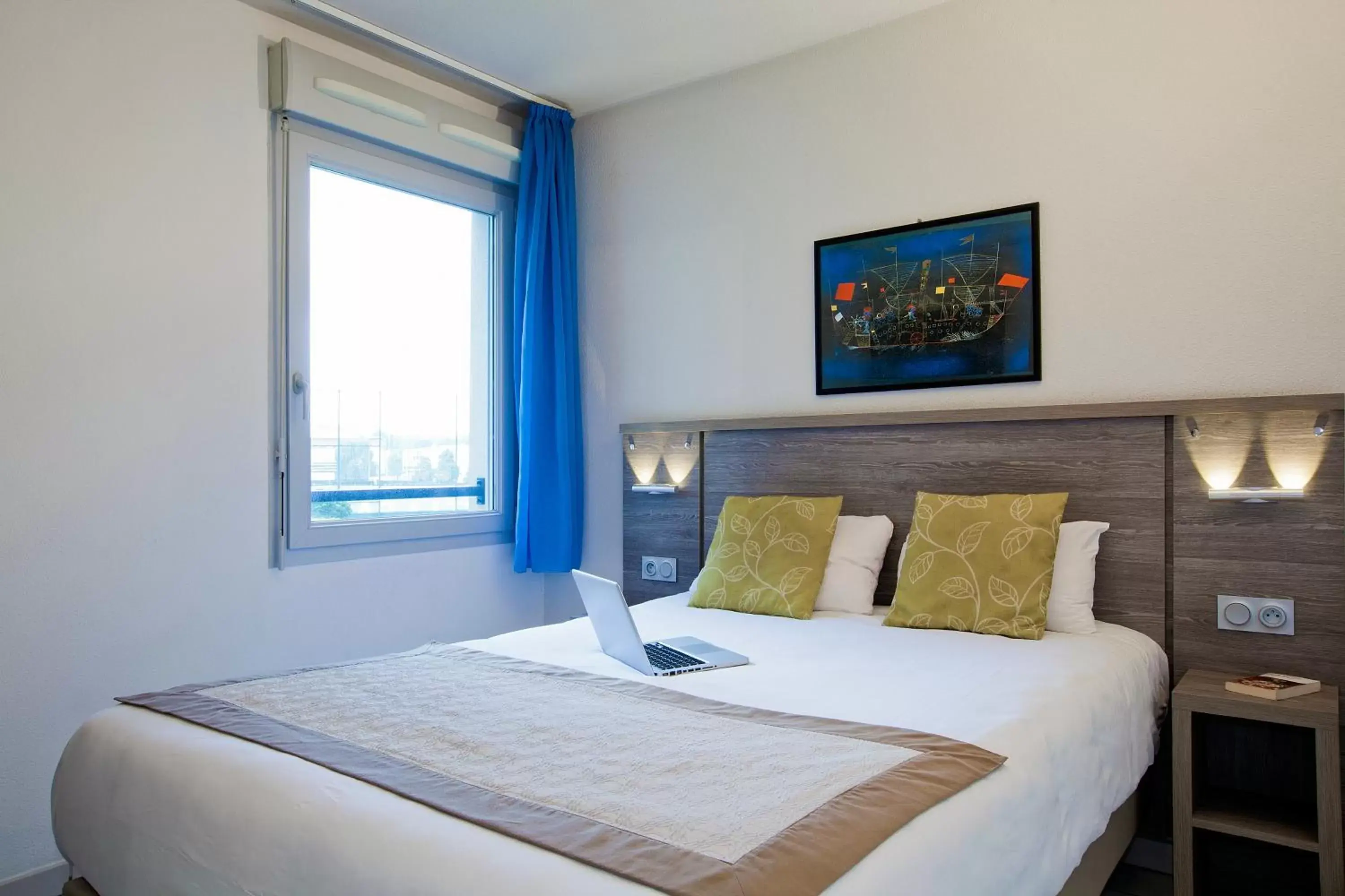 Bedroom, Bed in Séjours & Affaires Clermont Ferrand Park République Bedroom, Bed in Séjours & Affaires Clermont Ferrand Park République