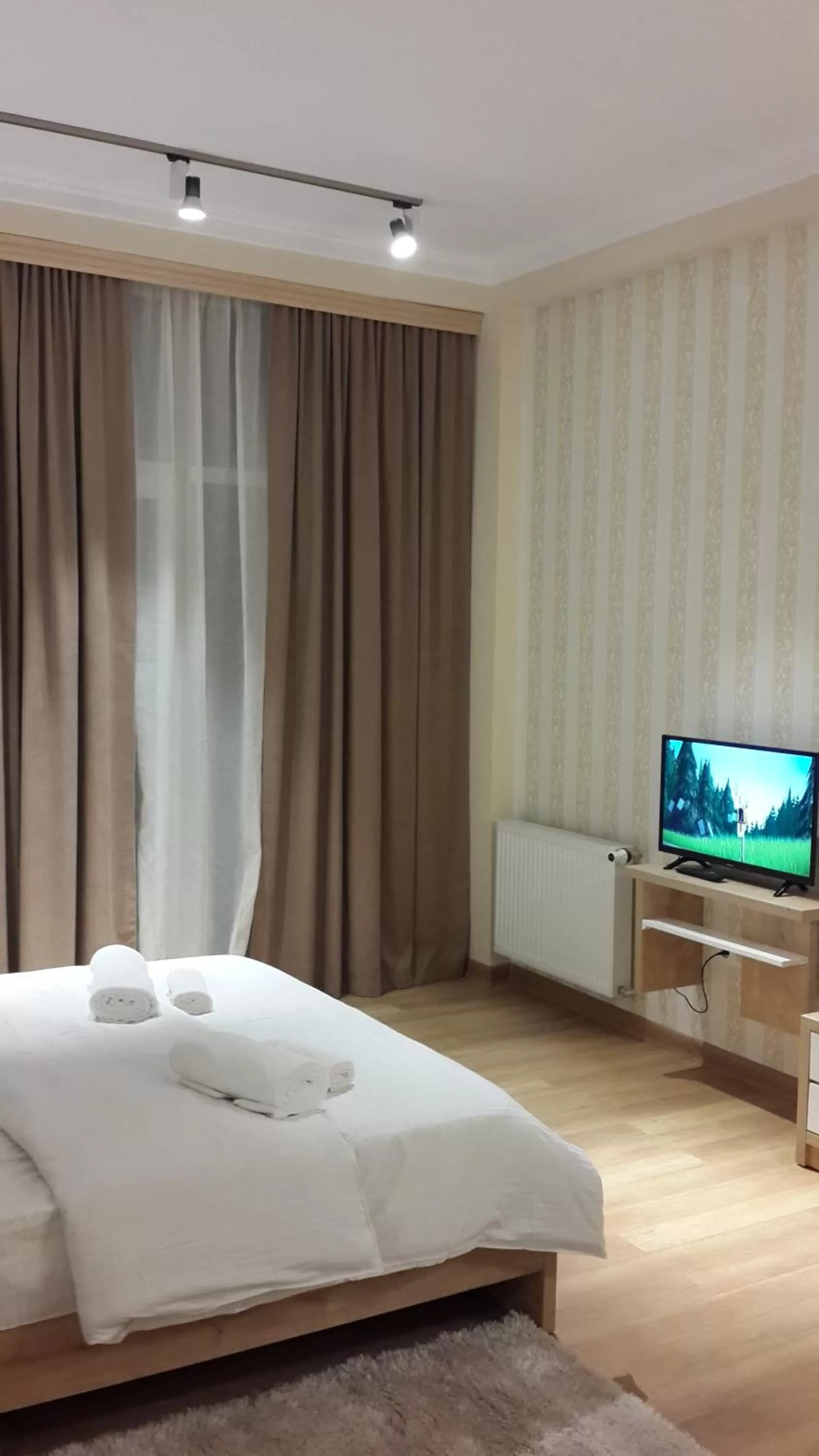 Bed in Happy Stay Hotel