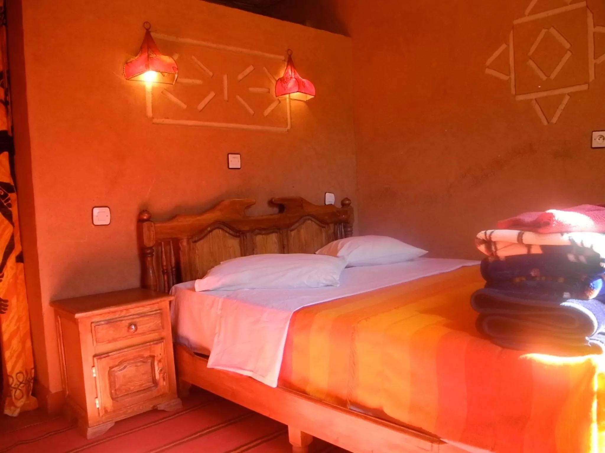 Bed in Maison d'Hôte Valentine