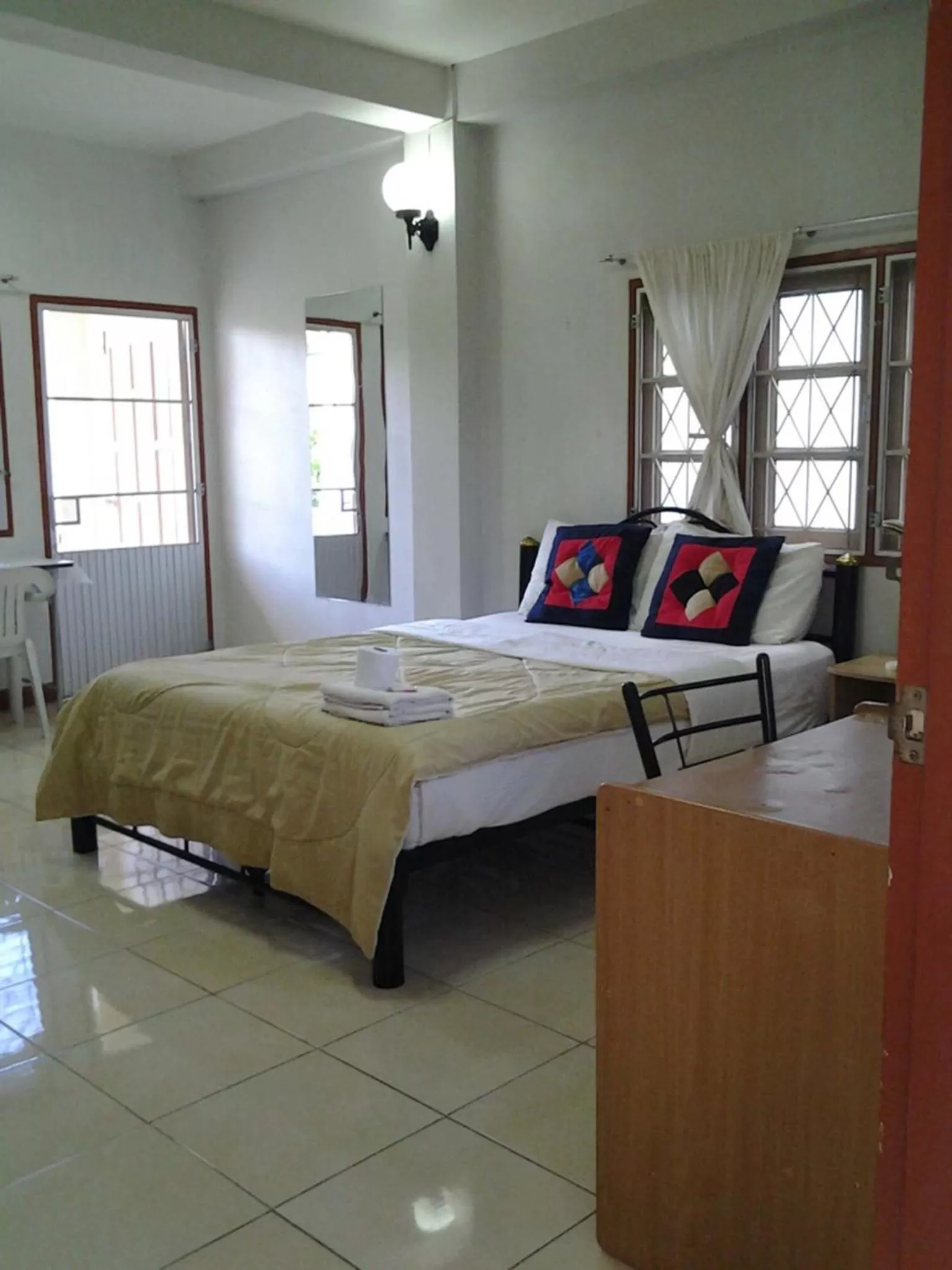 Bed in Pikul Apartment Hotel