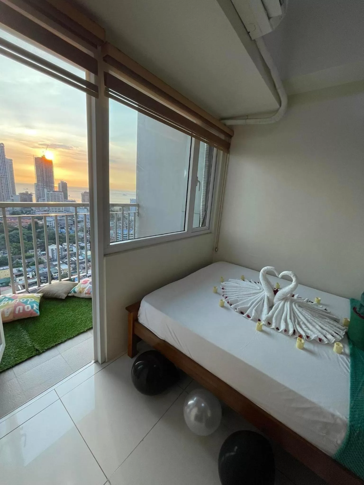 Bed in Green Residences Stays by PBYY