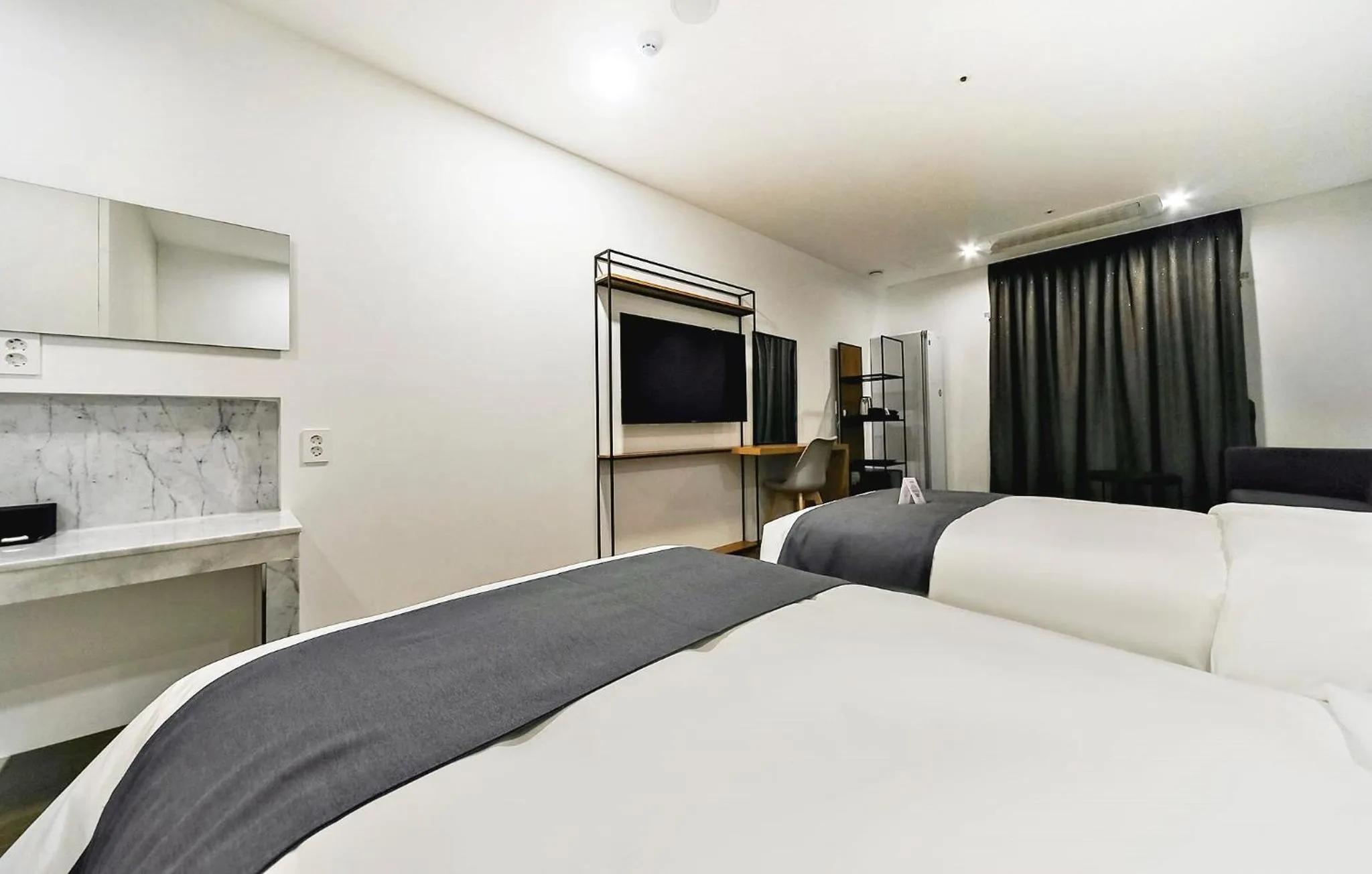 Bed in Hotel Noblestay