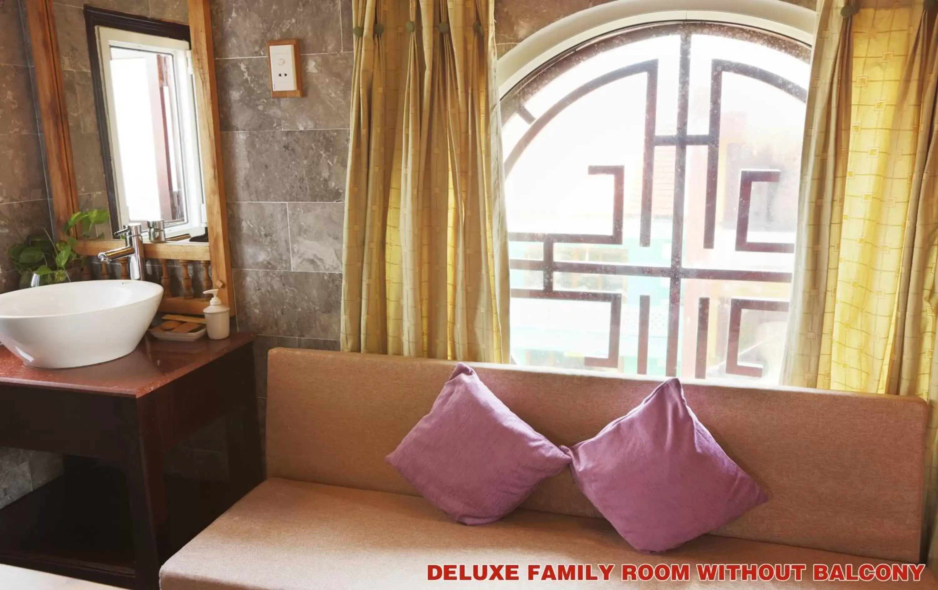 Seating area in Hoi An Pho Library Hotel