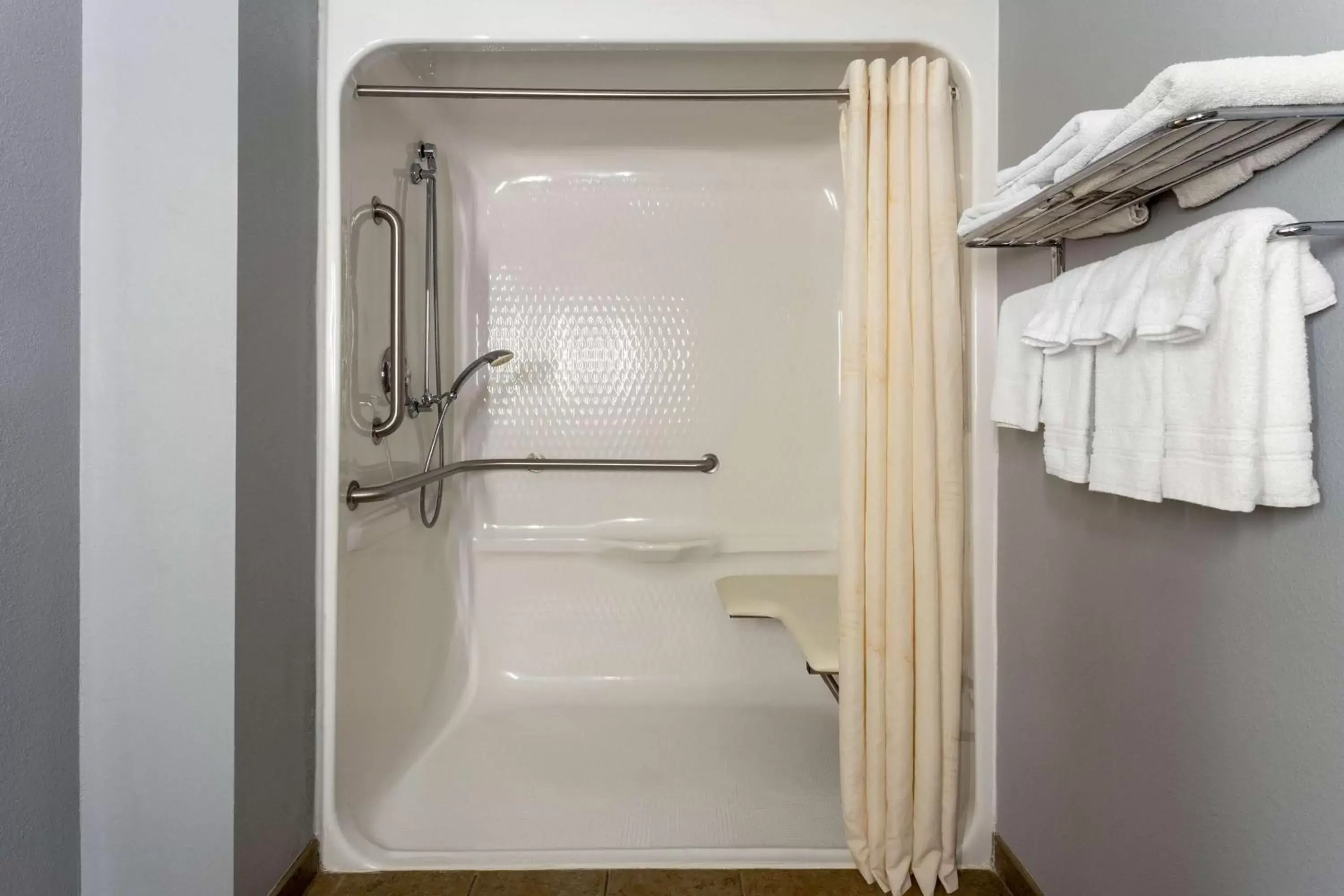 Bathroom in AmericInn by Wyndham Fulton Clinton Bathroom in AmericInn by Wyndham Fulton Clinton