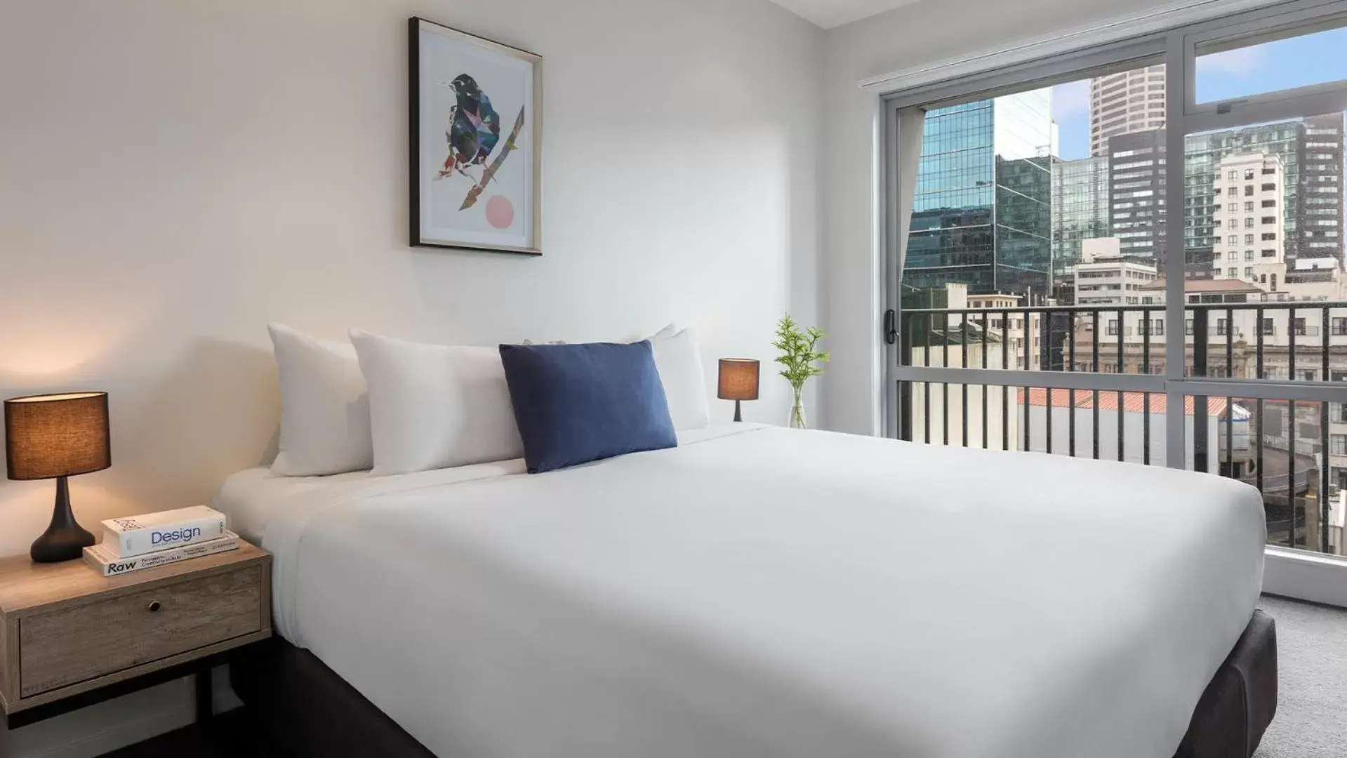 Bed in Auckland Harbour Suites