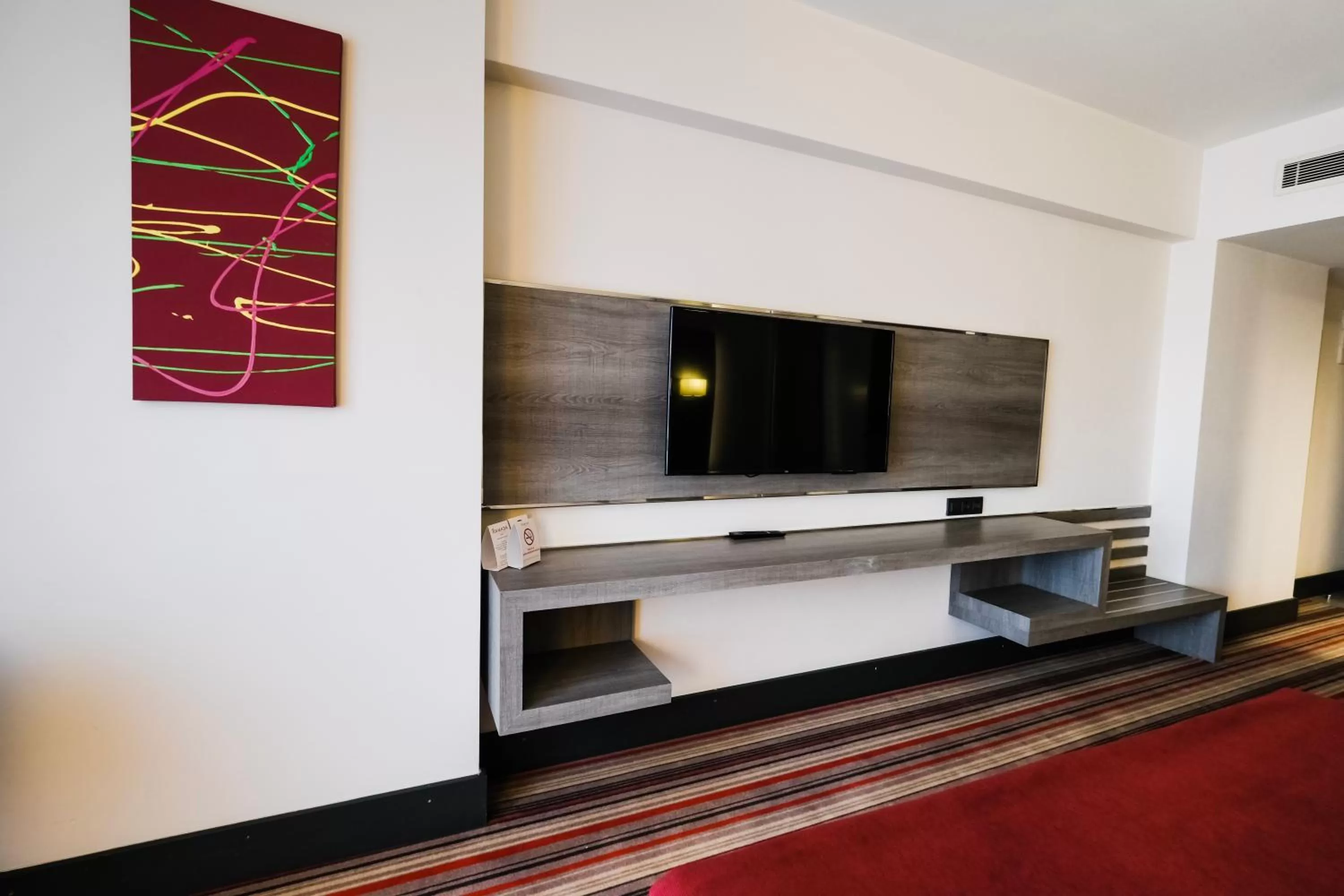TV and multimedia in Ramada Plaza By Wyndham Izmir
