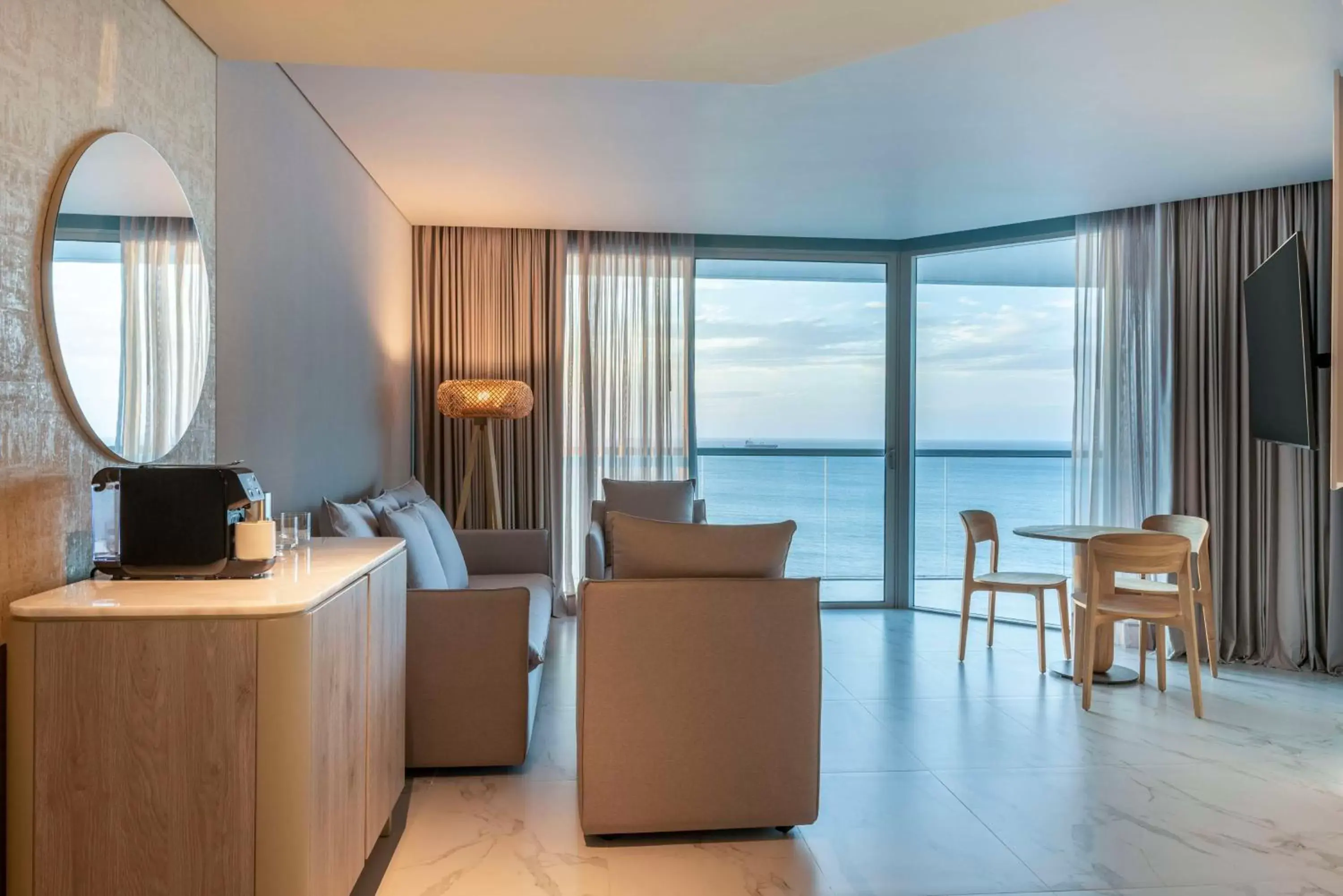 Bedroom, Seating Area in Hilton Santa Marta