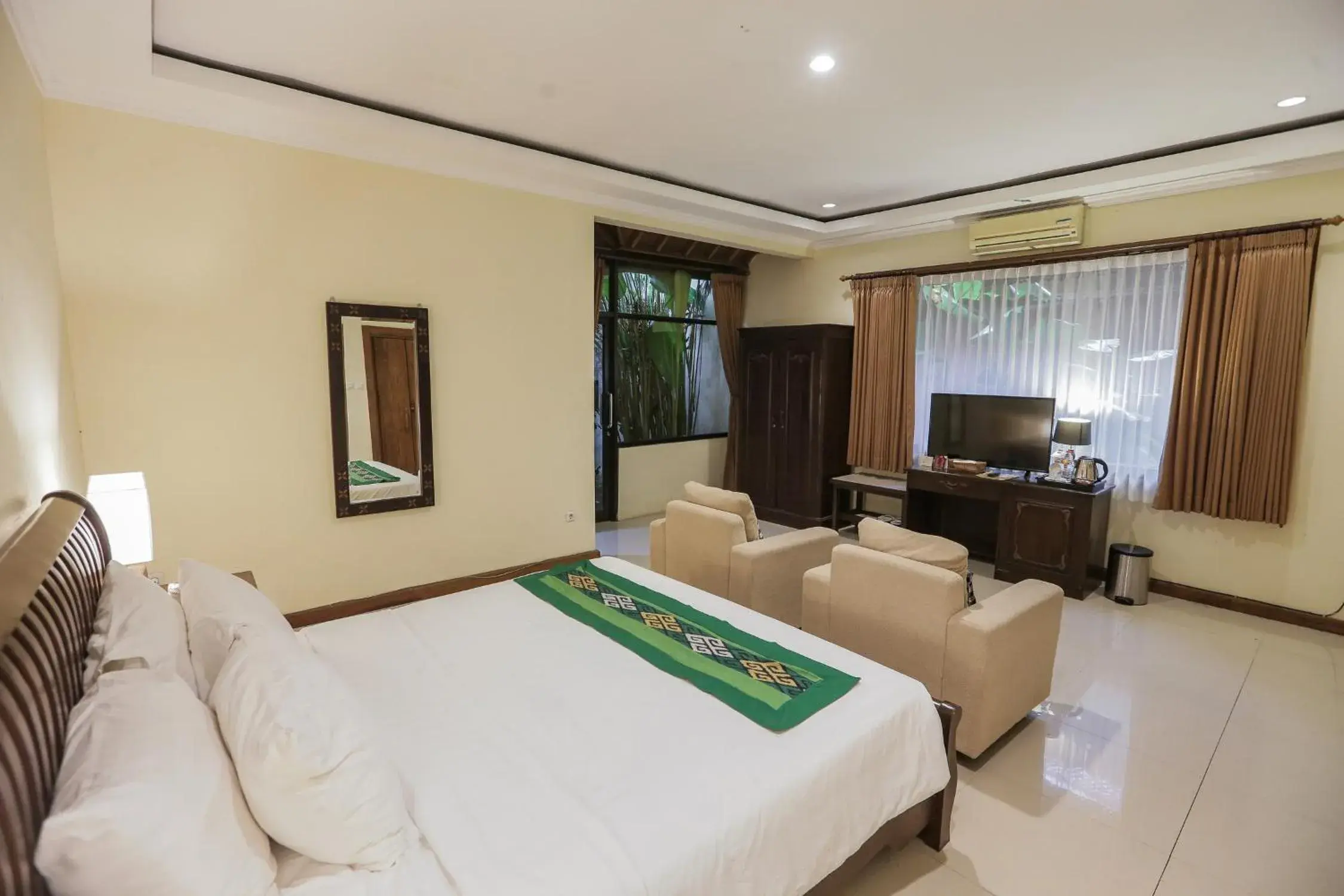 Bedroom in Ubud Hotel and Cottages