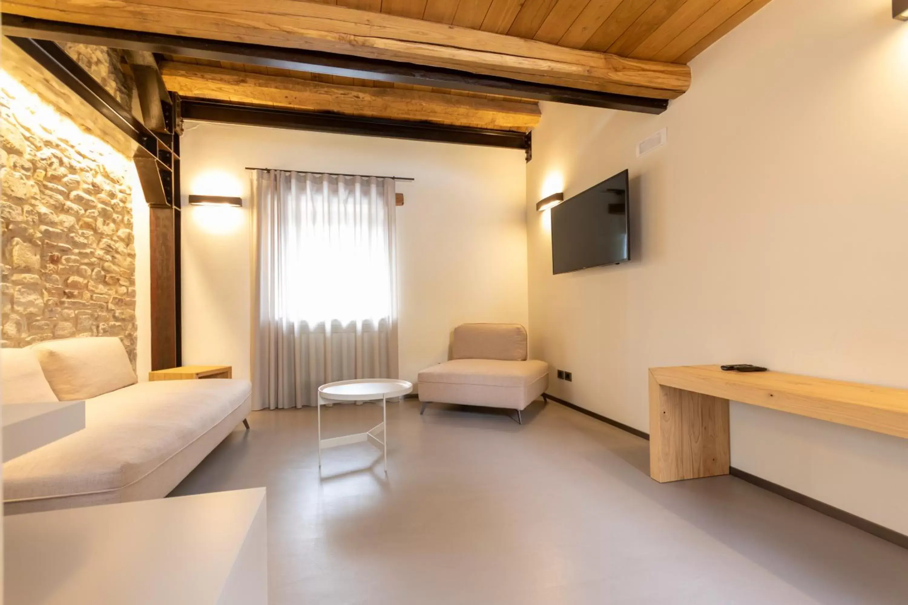 Photo of the whole room, Seating Area in Borgotufi Albergo Diffuso