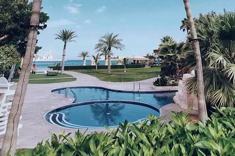 Swimming Pool in Dubai Marine Beach Resort & Spa