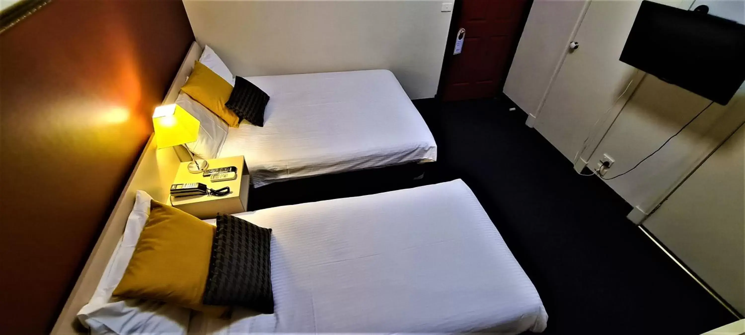 Bed in Brunswick Tower Hotel