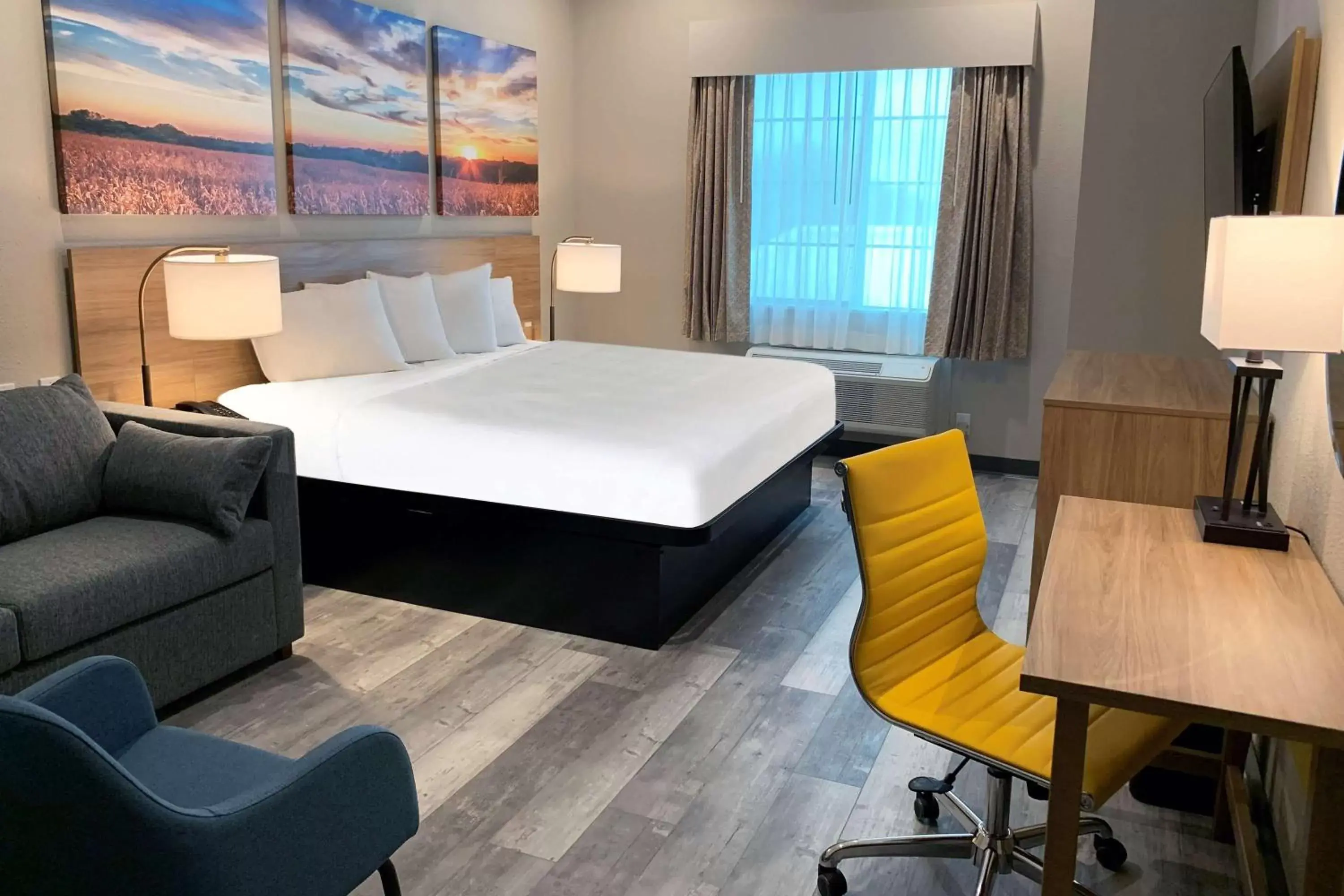 Photo of the whole room, Bed in Days Inn & Suites by Wyndham Greater Tomball Photo of the whole room, Bed in Days Inn & Suites by Wyndham Greater Tomball