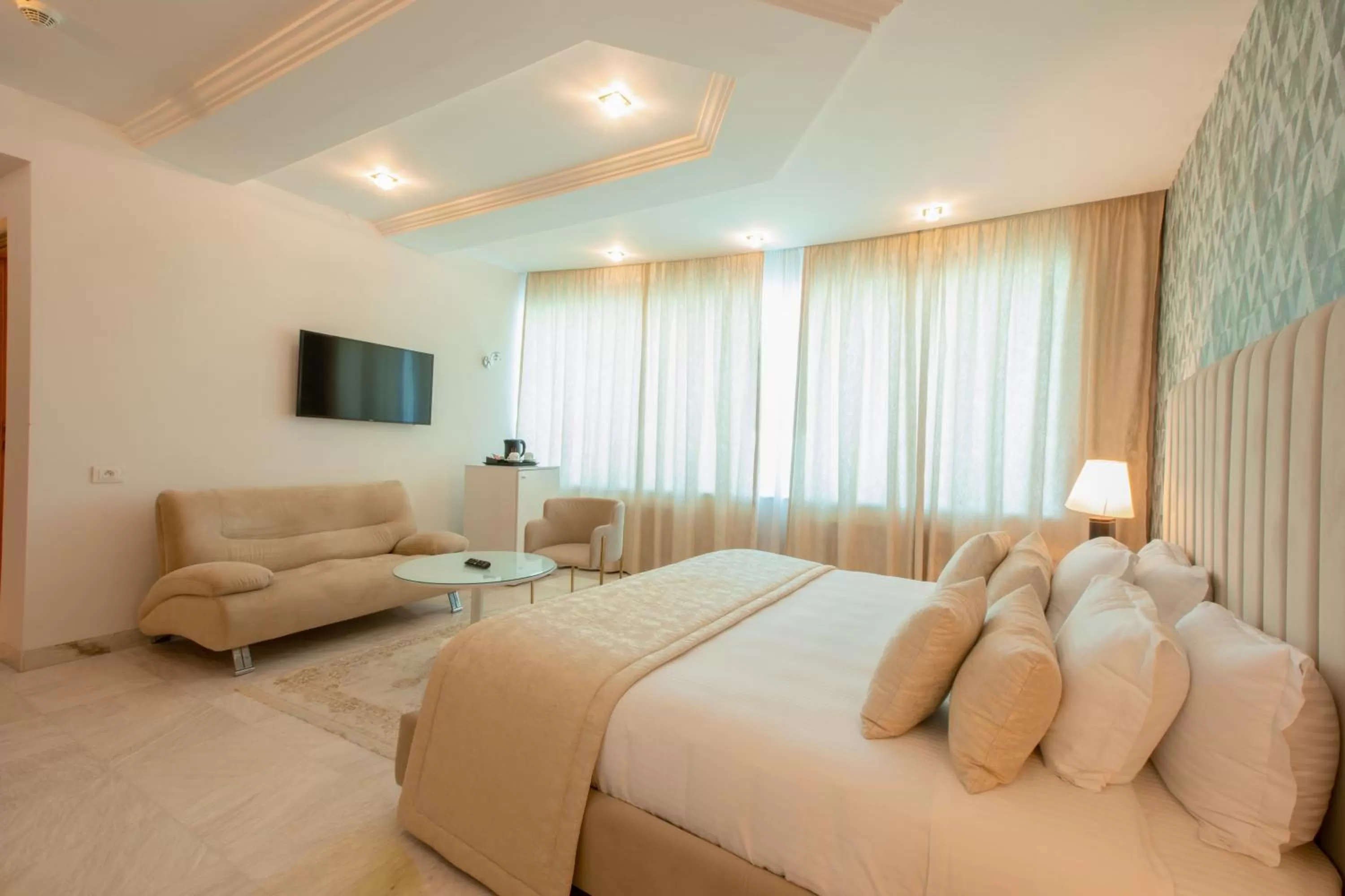 Photo of the whole room, Bed in The Penthouse Suites Hotel