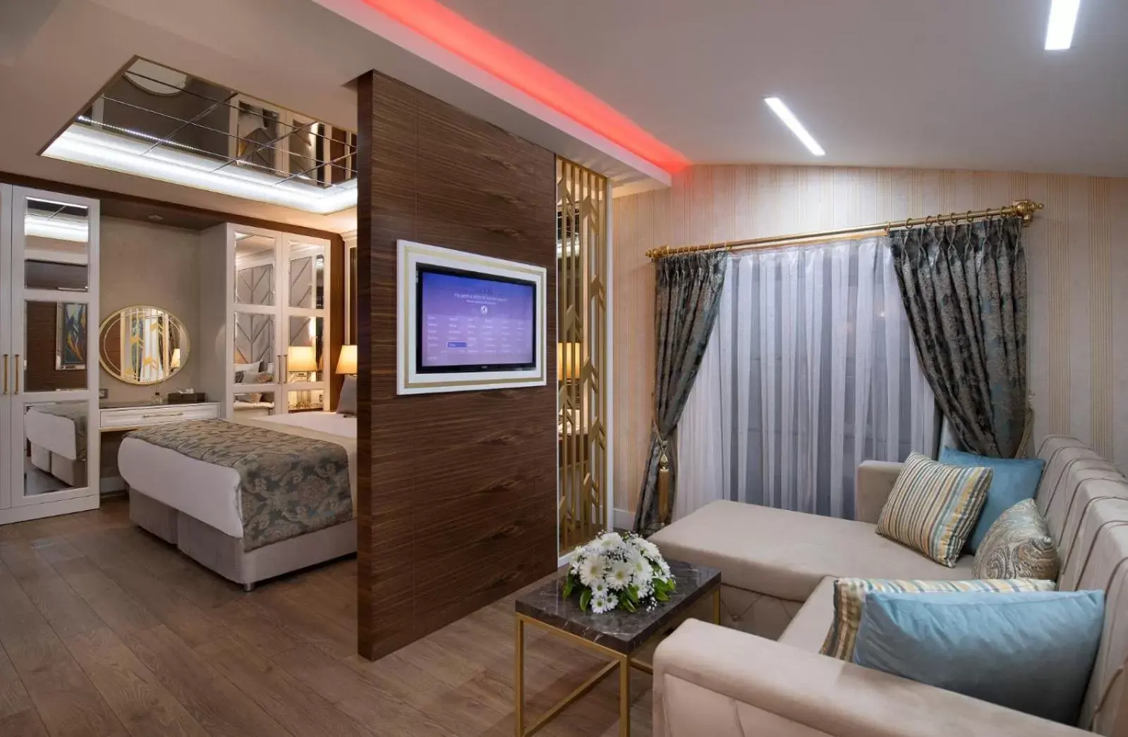 TV and multimedia, Bed in Elysium Green Suites