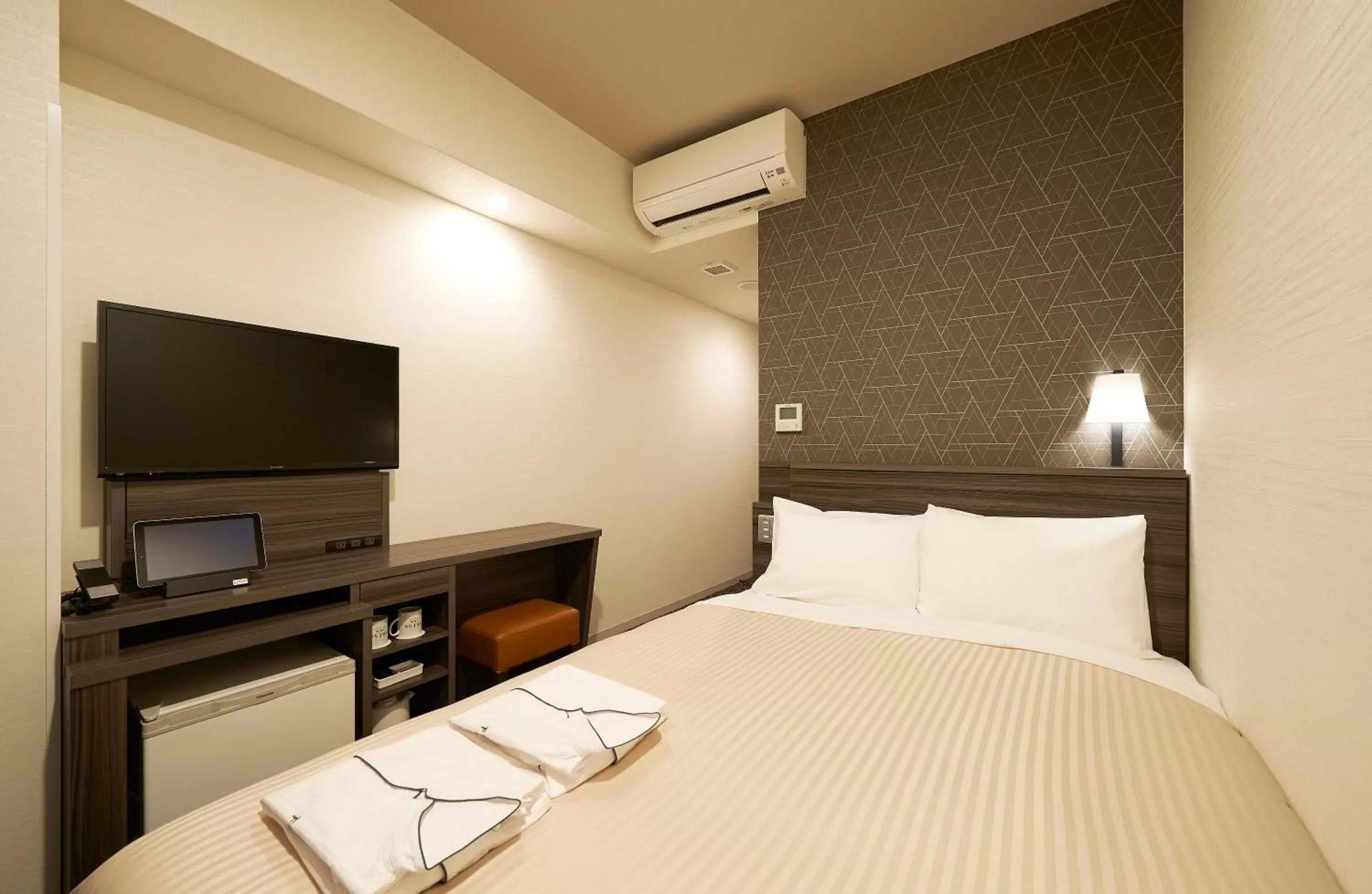 Bed in Sotetsu Fresa Inn Osaka Shinsaibashi Bed in Sotetsu Fresa Inn Osaka Shinsaibashi