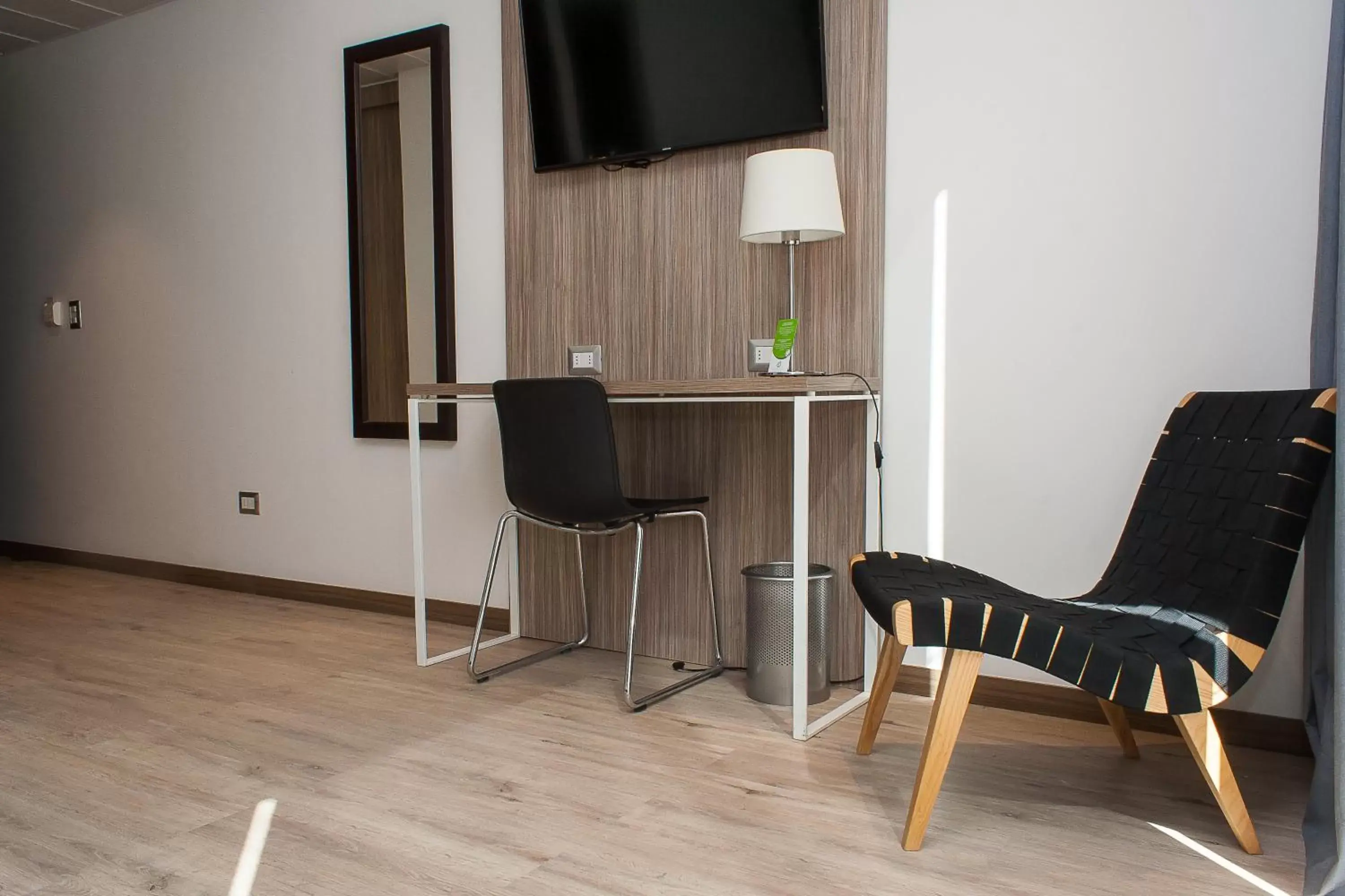 Seating area, TV/Entertainment Center in Hotel Capital Bellet