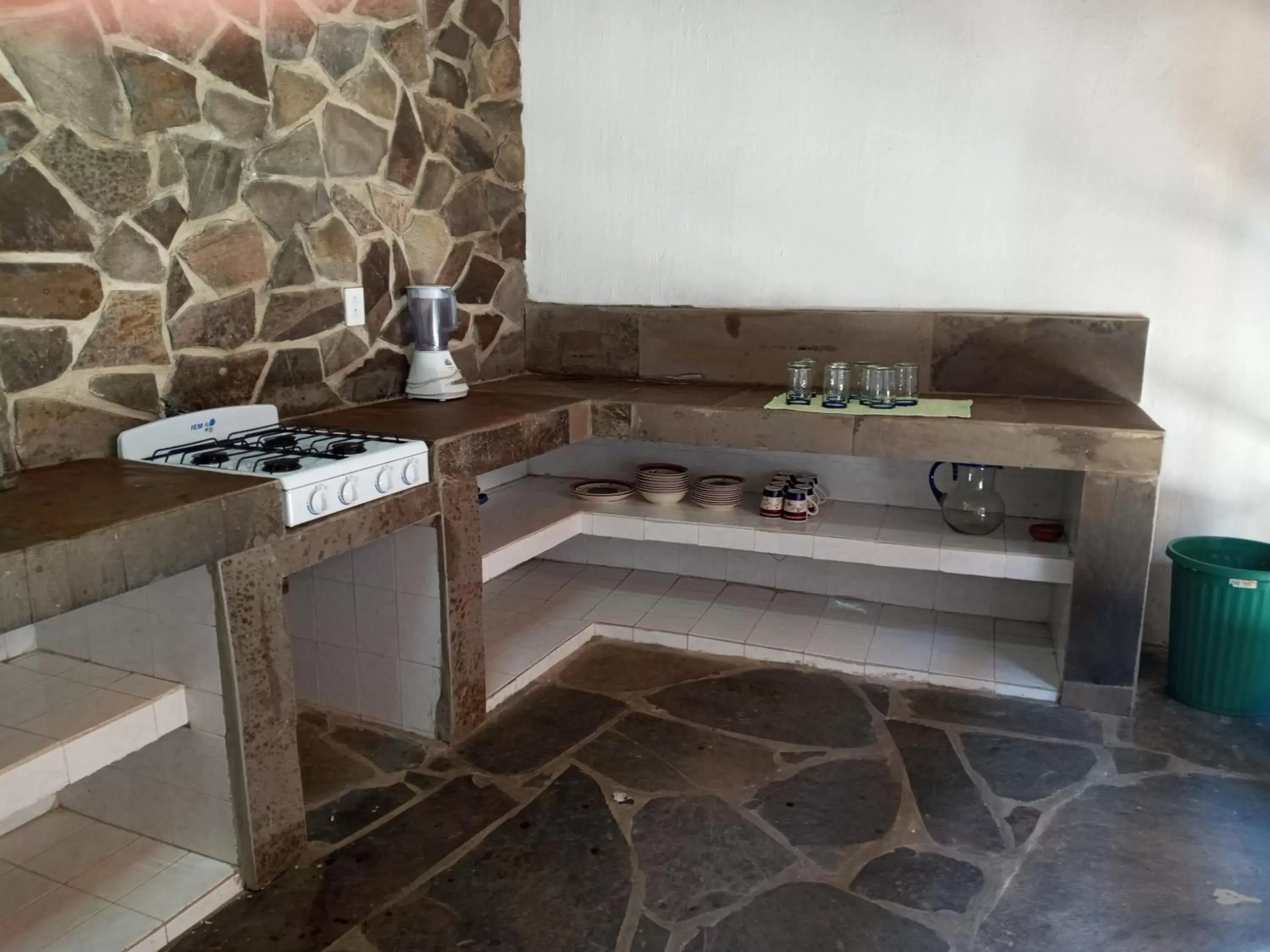 Kitchen or kitchenette in Las Margaritas Hotel Posada