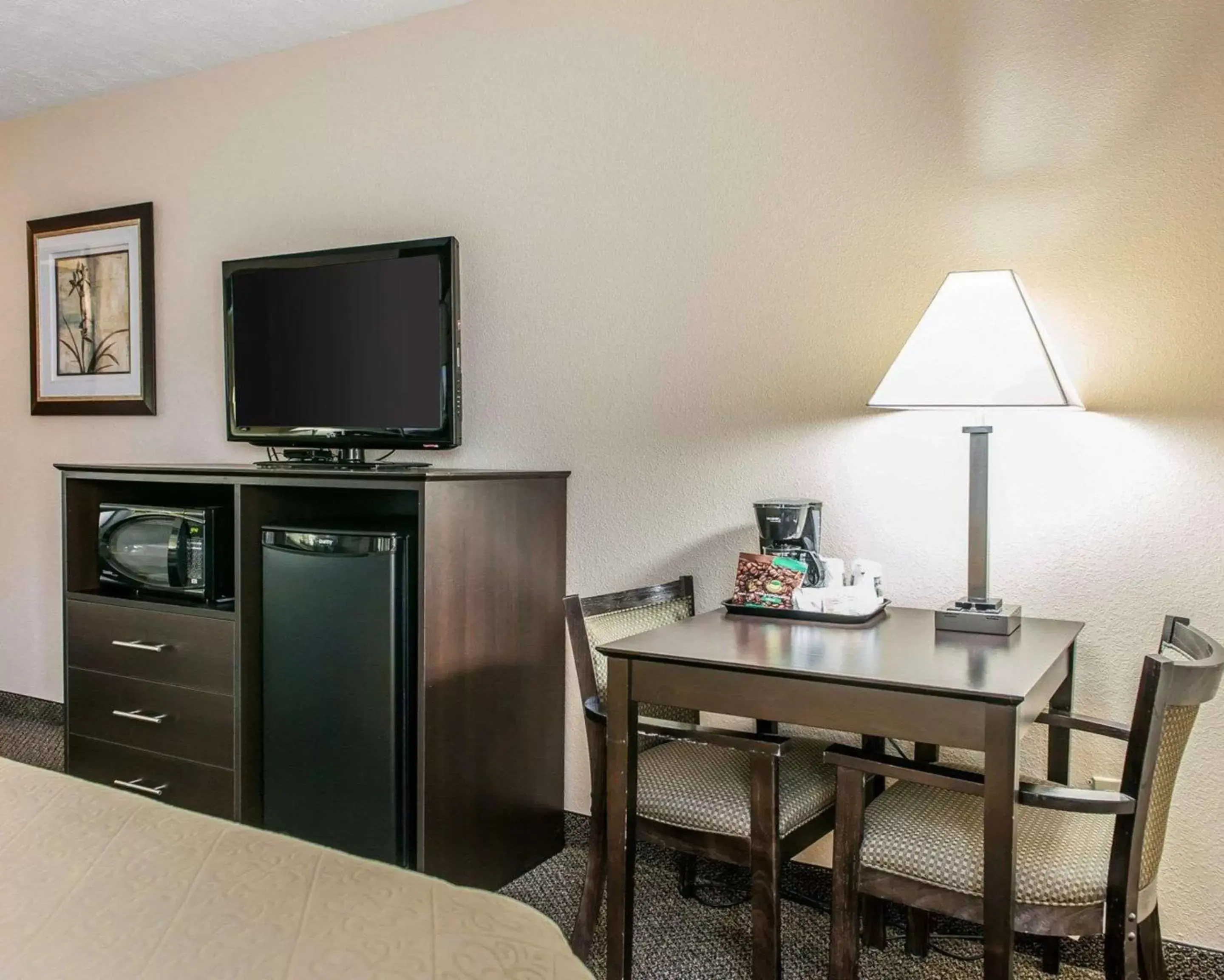 Photo of the whole room, TV/Entertainment Center in Quality Inn & Suites - Mattoon