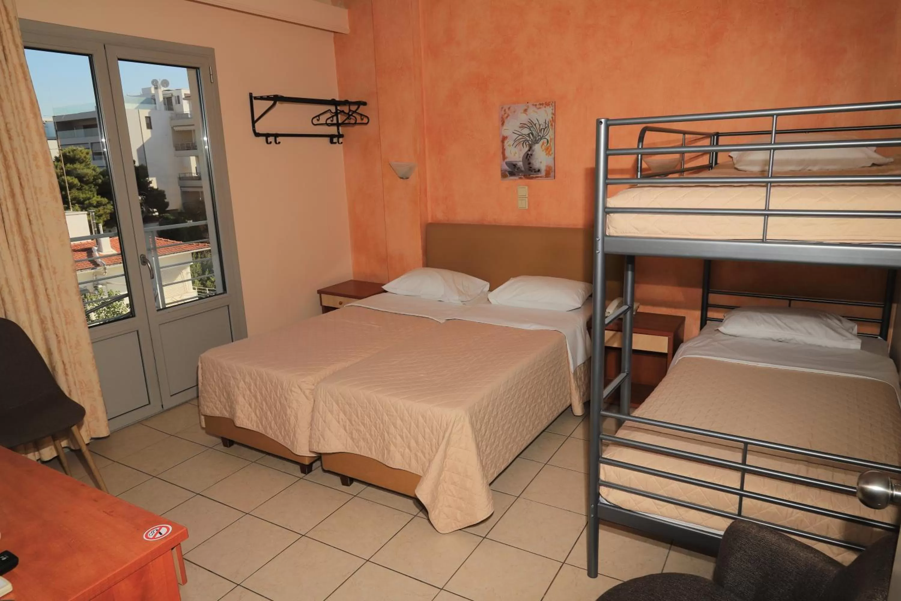 Bed in IKAROS Hotel ELLINIKO