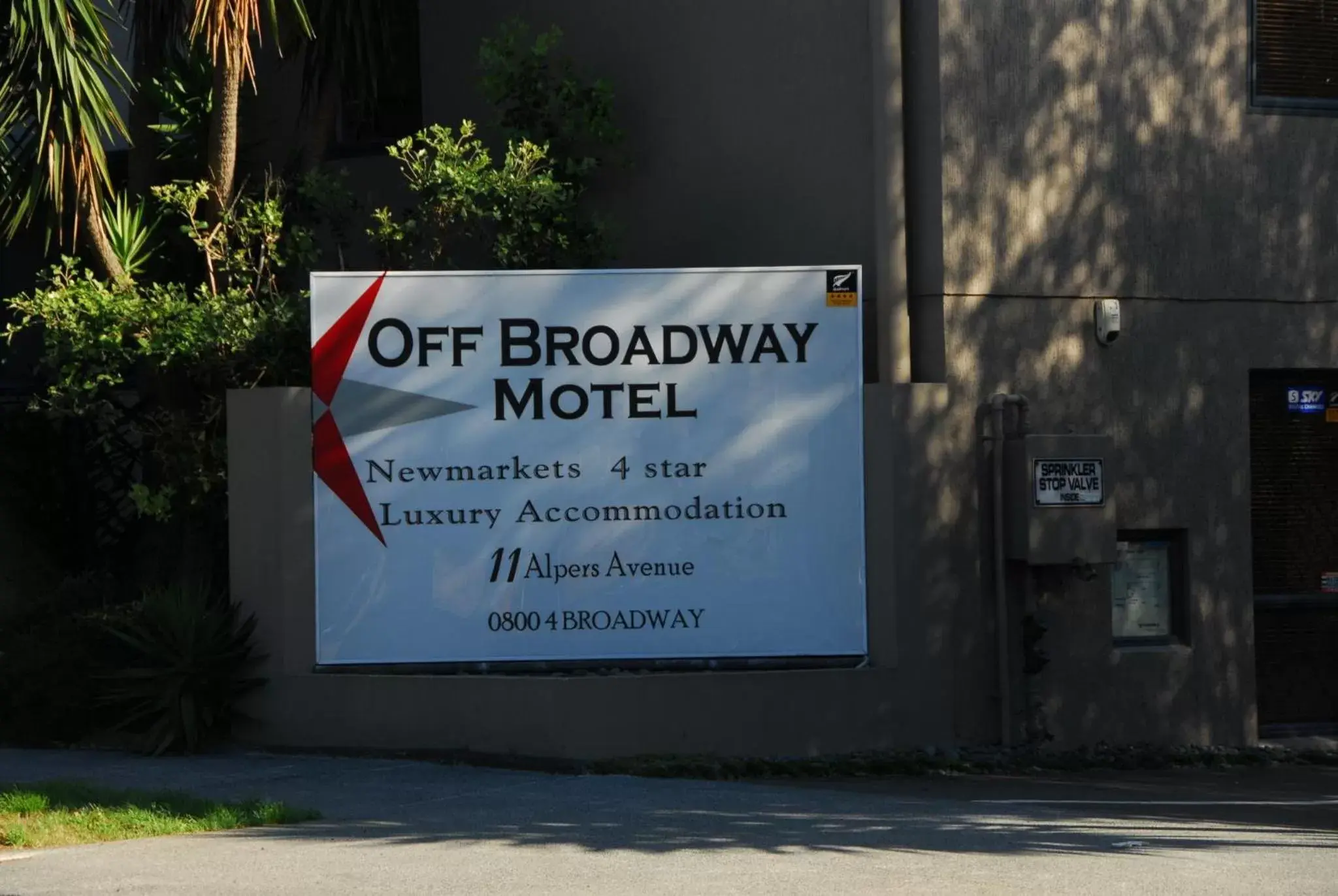 Property logo or sign in Off Broadway Motel