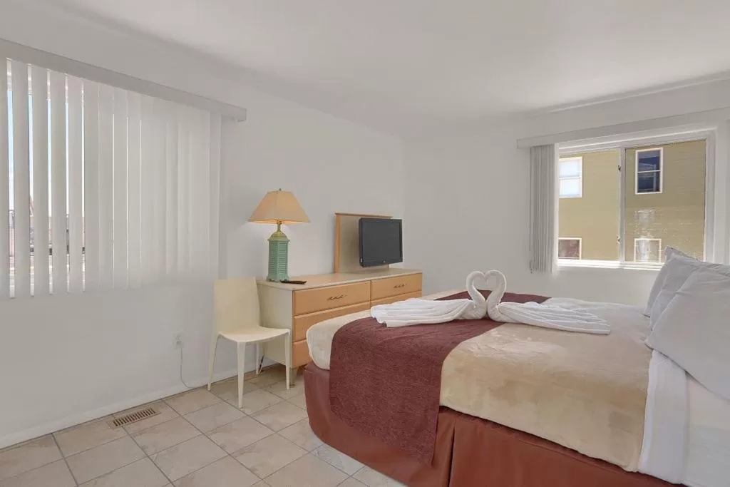 Bed in Heart of Wildwood Boardwalk Motel