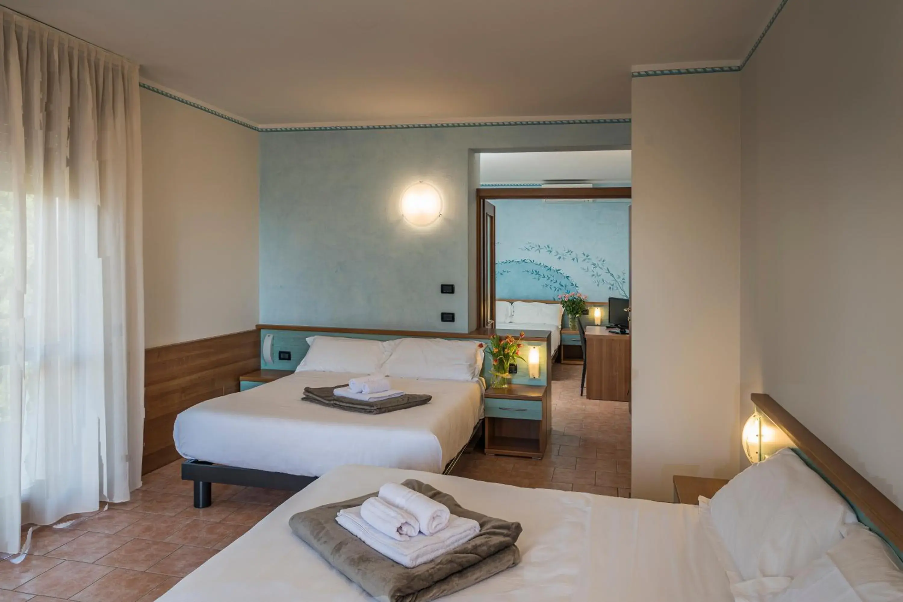Bed in Hotel Gardenia