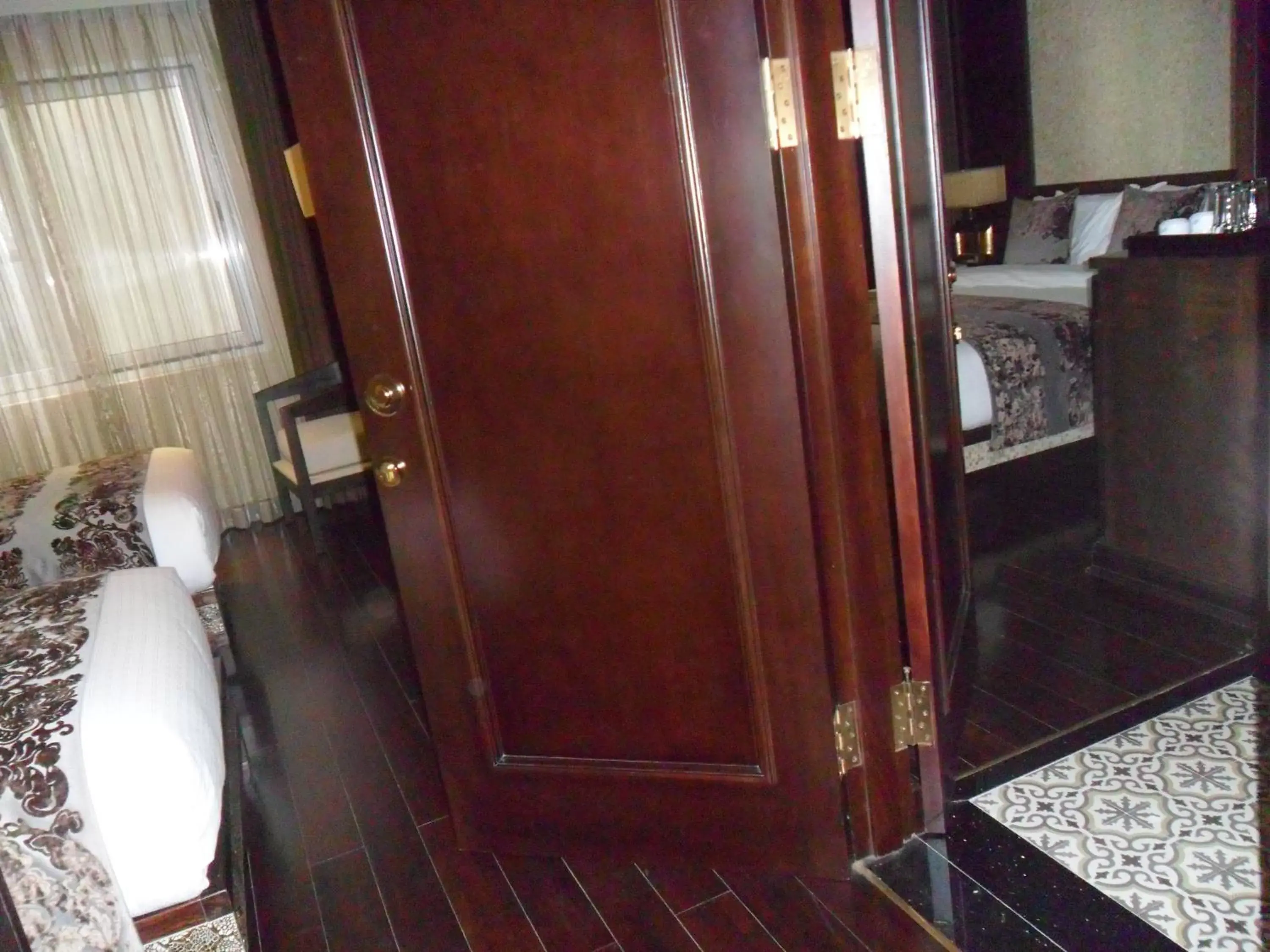 Living room, Bathroom in Golden Lotus Luxury Hotel