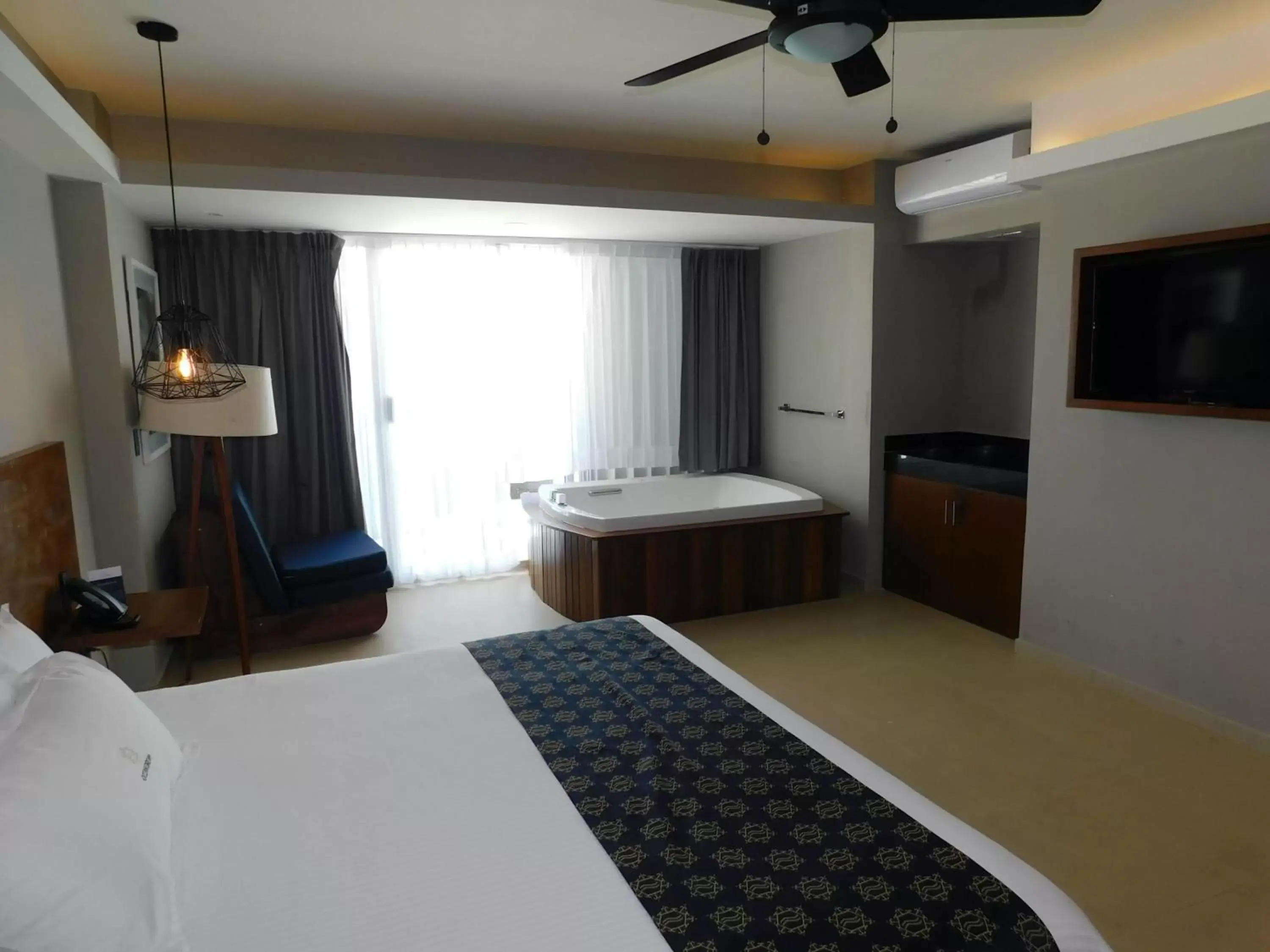 Bed in Ocean Dream Cancun by GuruHotel