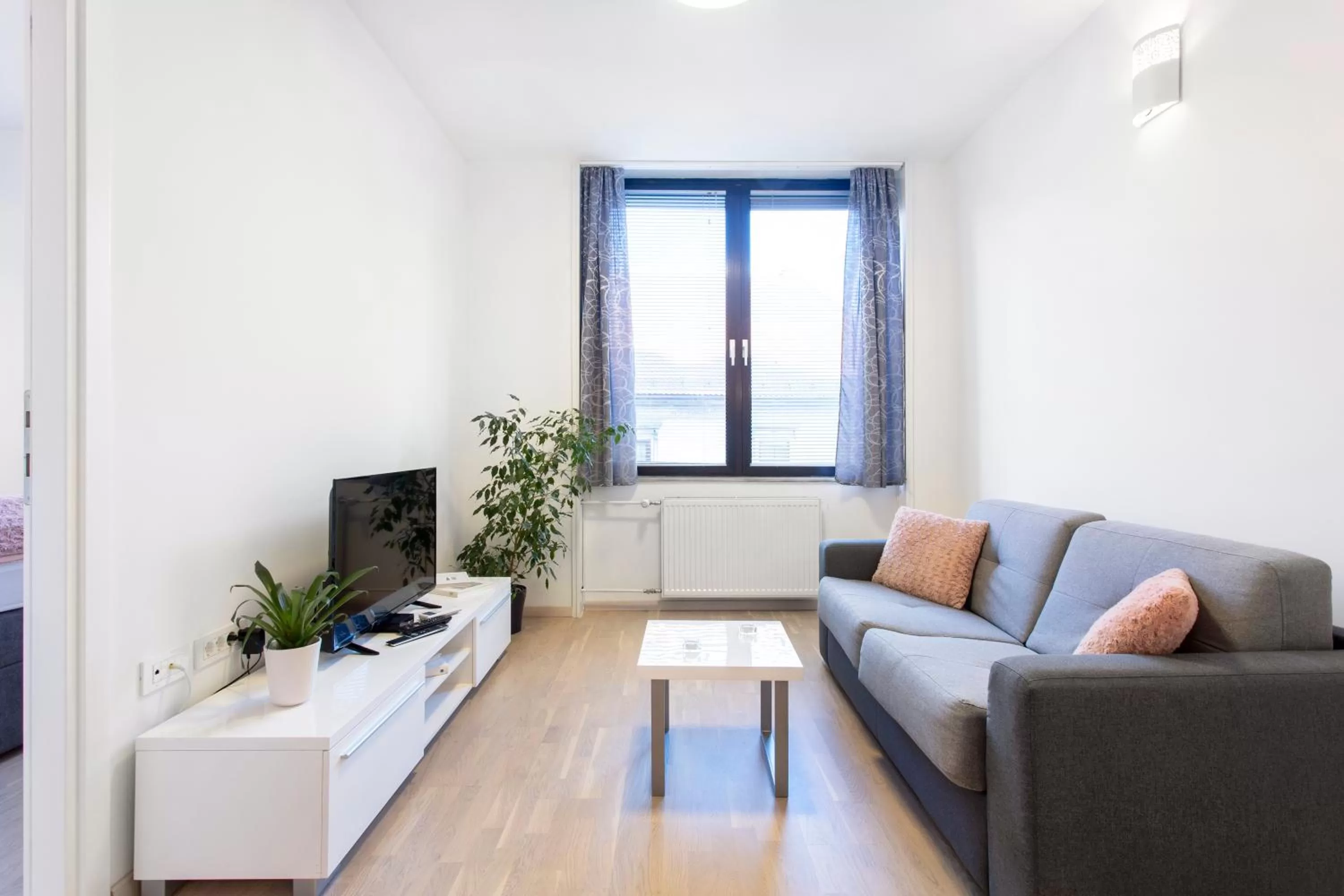 TV and multimedia, Seating Area in Urban Style Apartments by Loft