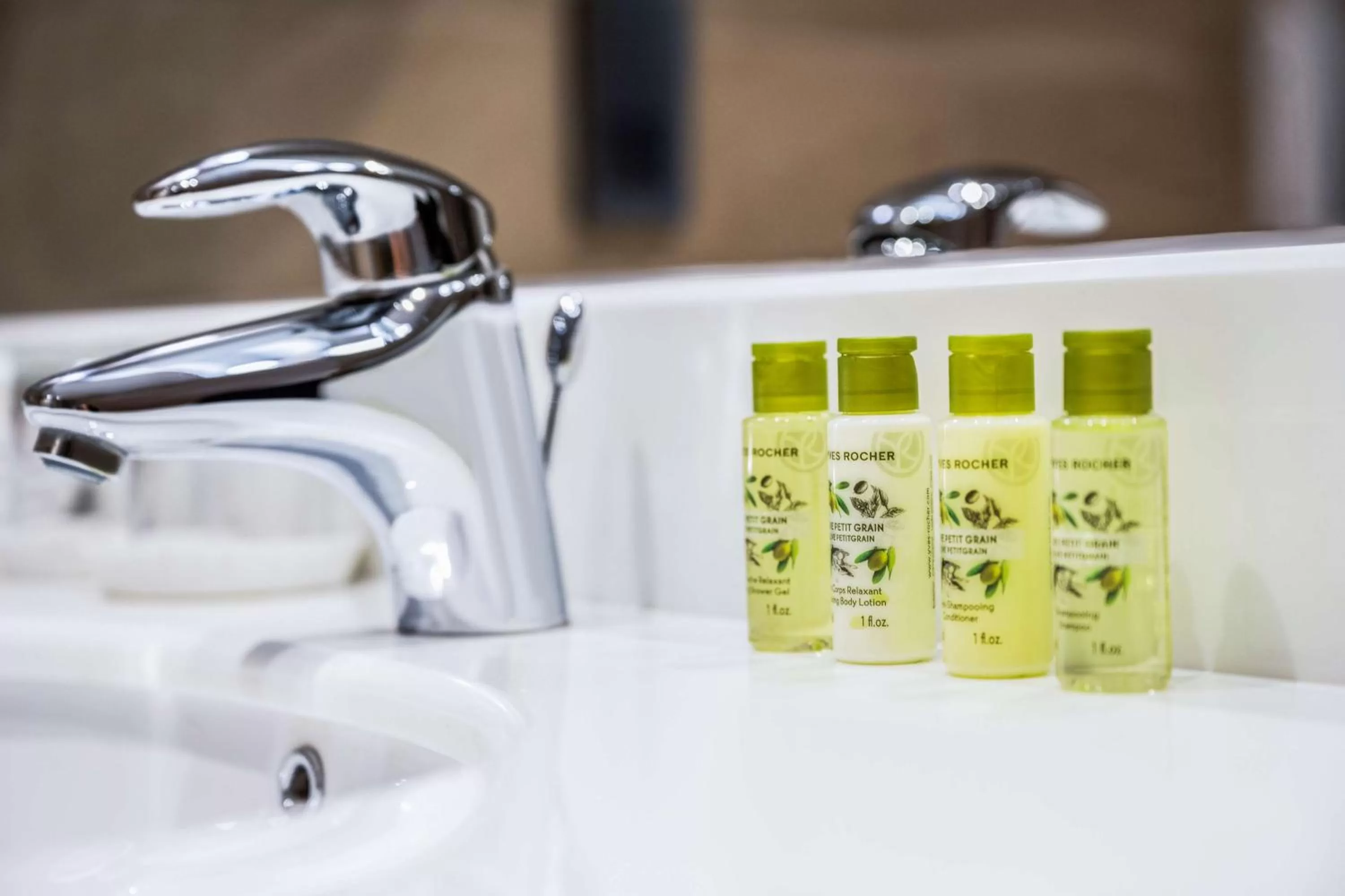 Bathroom in Aleph Doha Residences, Curio Collection By Hilton