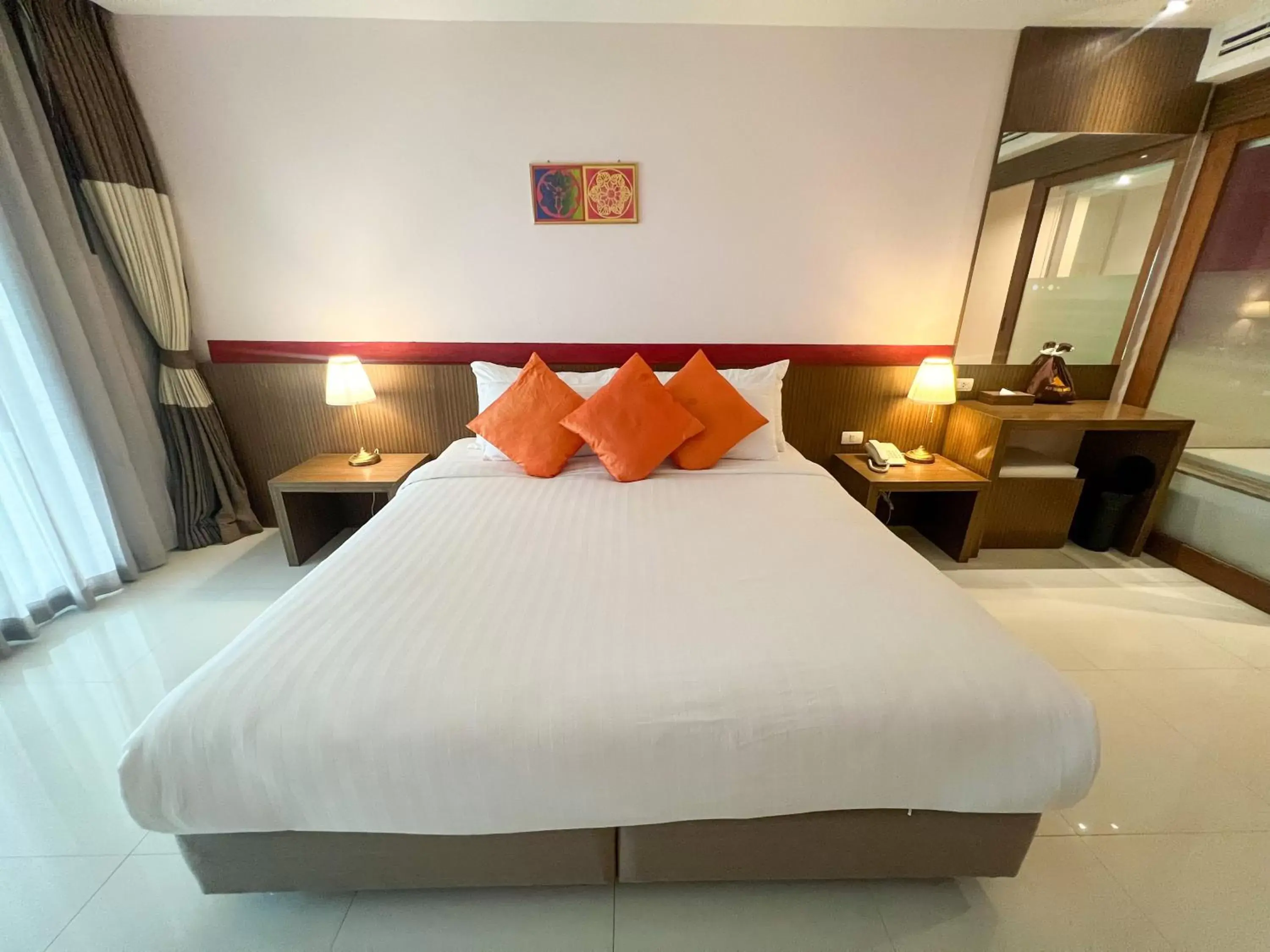 Bed in Siam Triangle Hotel