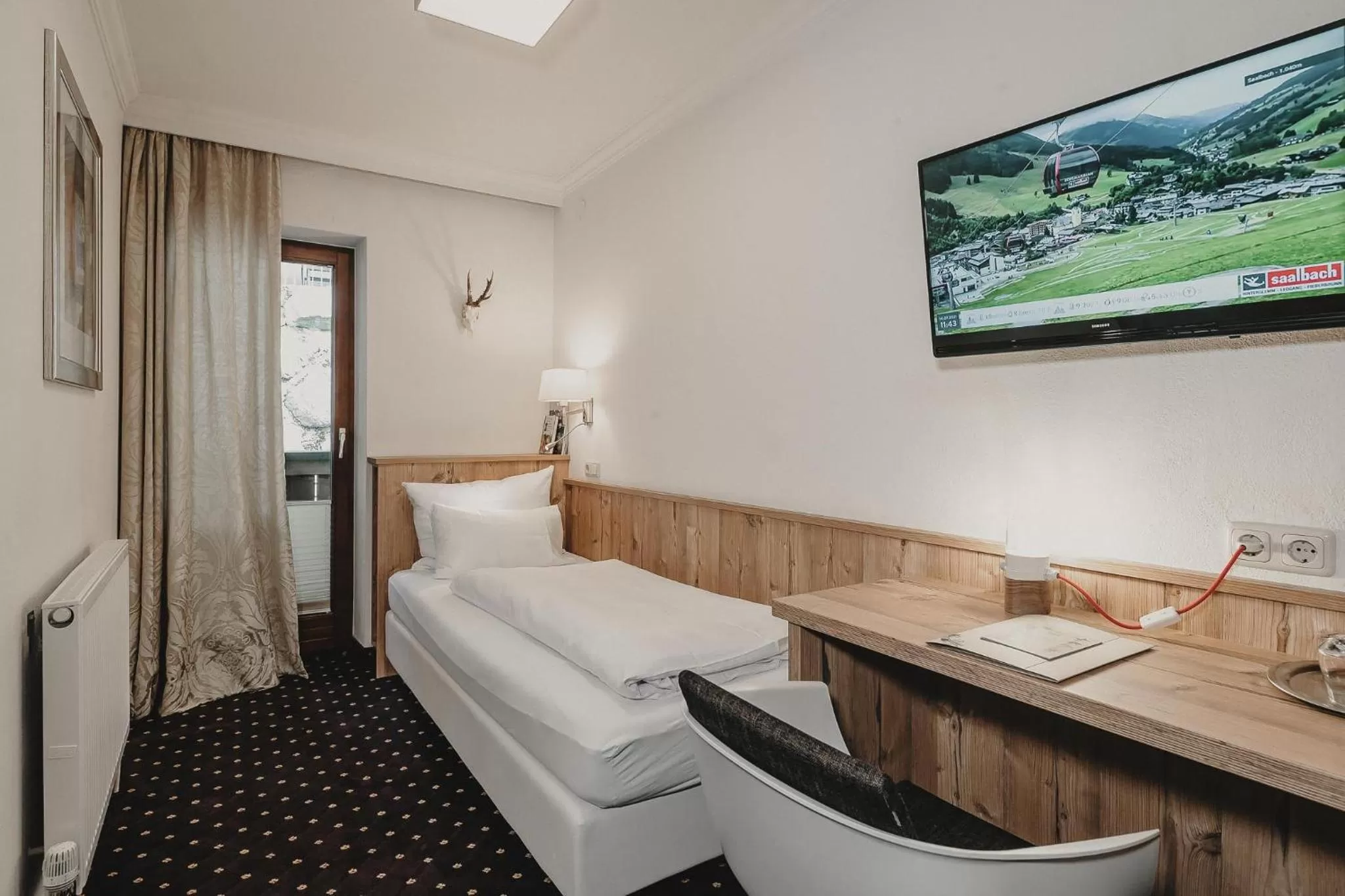 Photo of the whole room, Bed in Hotel & Appartements Tiroler Buam