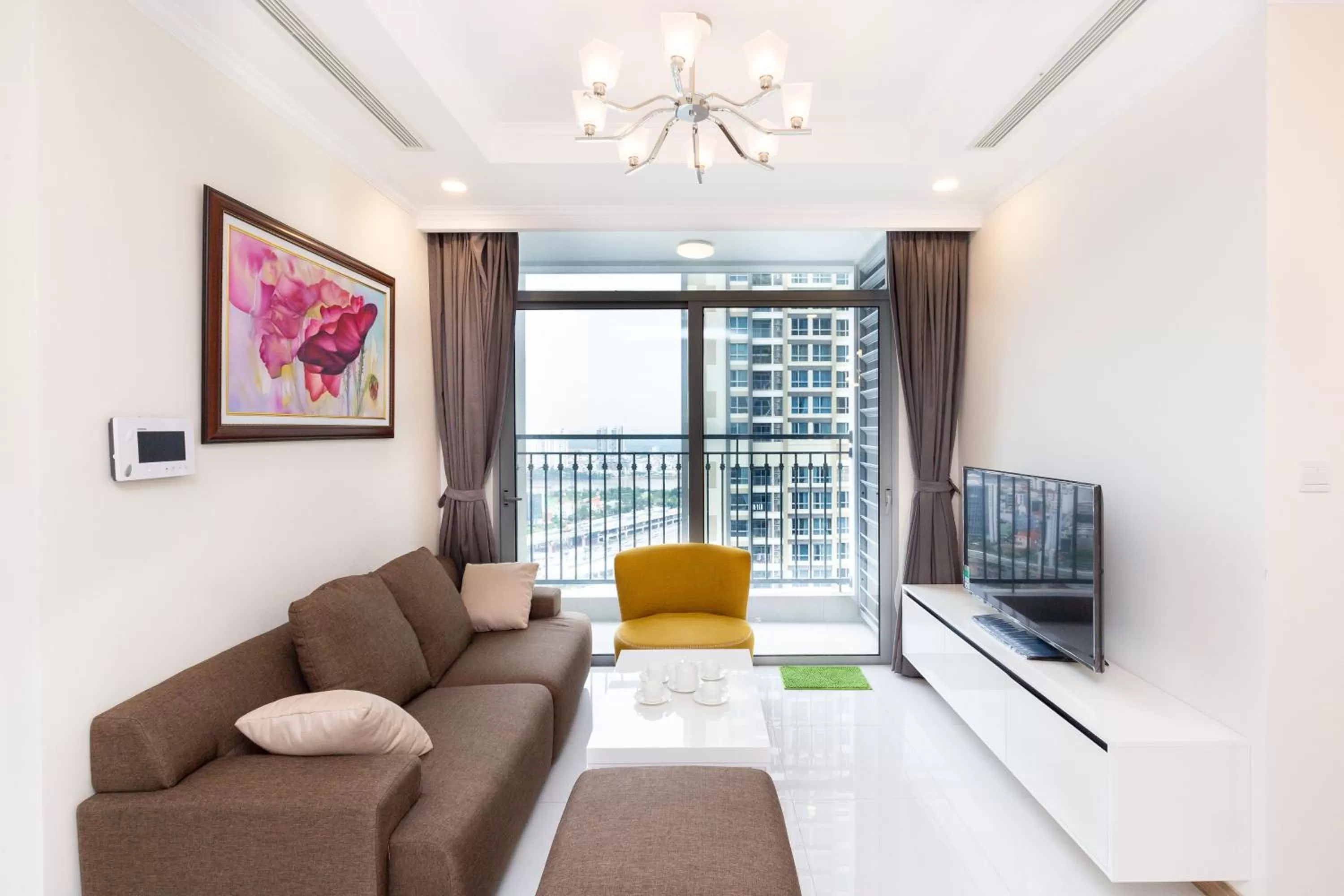 TV and multimedia, Seating Area in Vinhomes Central Park-Nice Homes