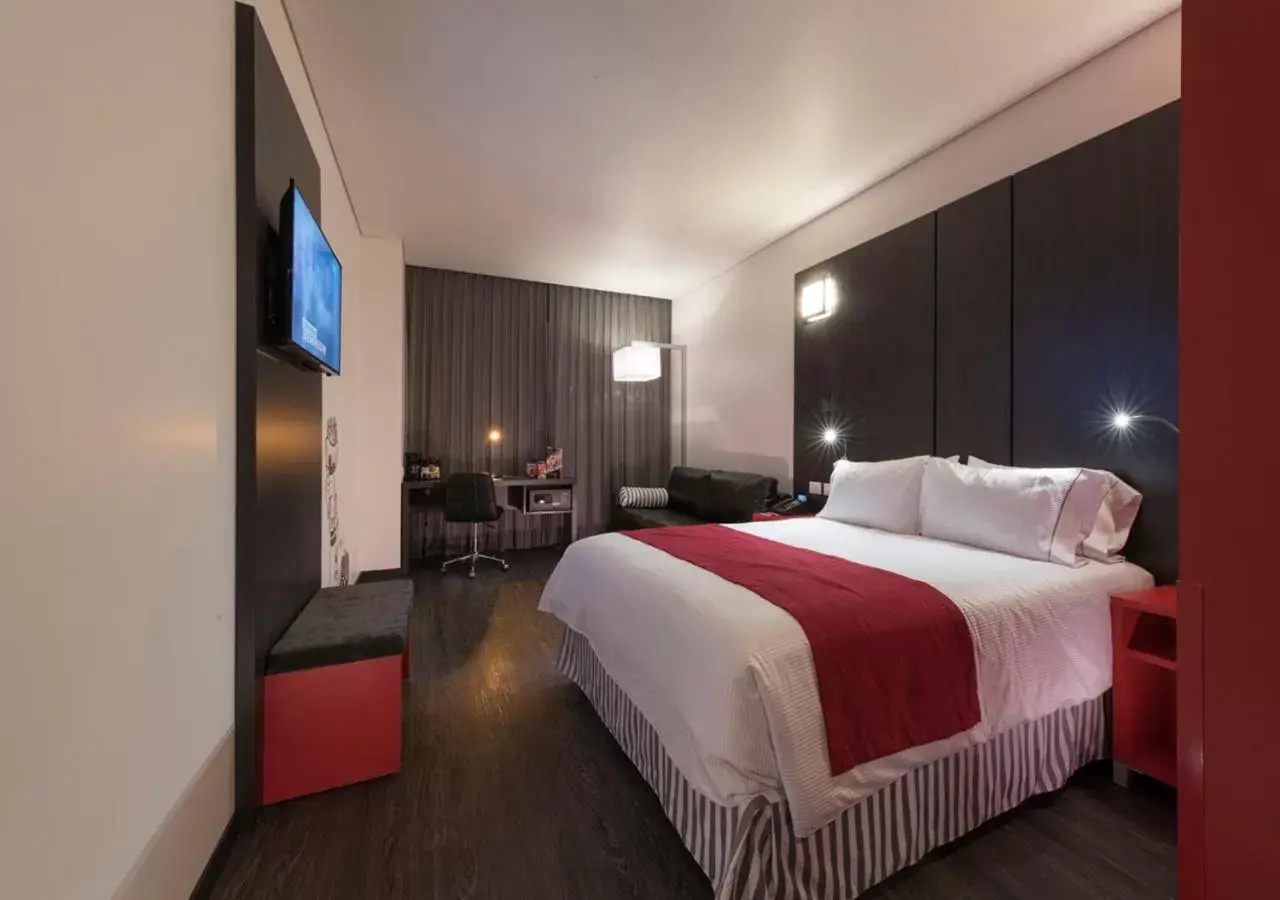 Bed in Ramada Encore by Wyndham San Luis Potosi