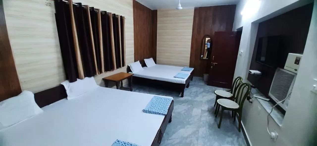 Bed in Gokul guest house