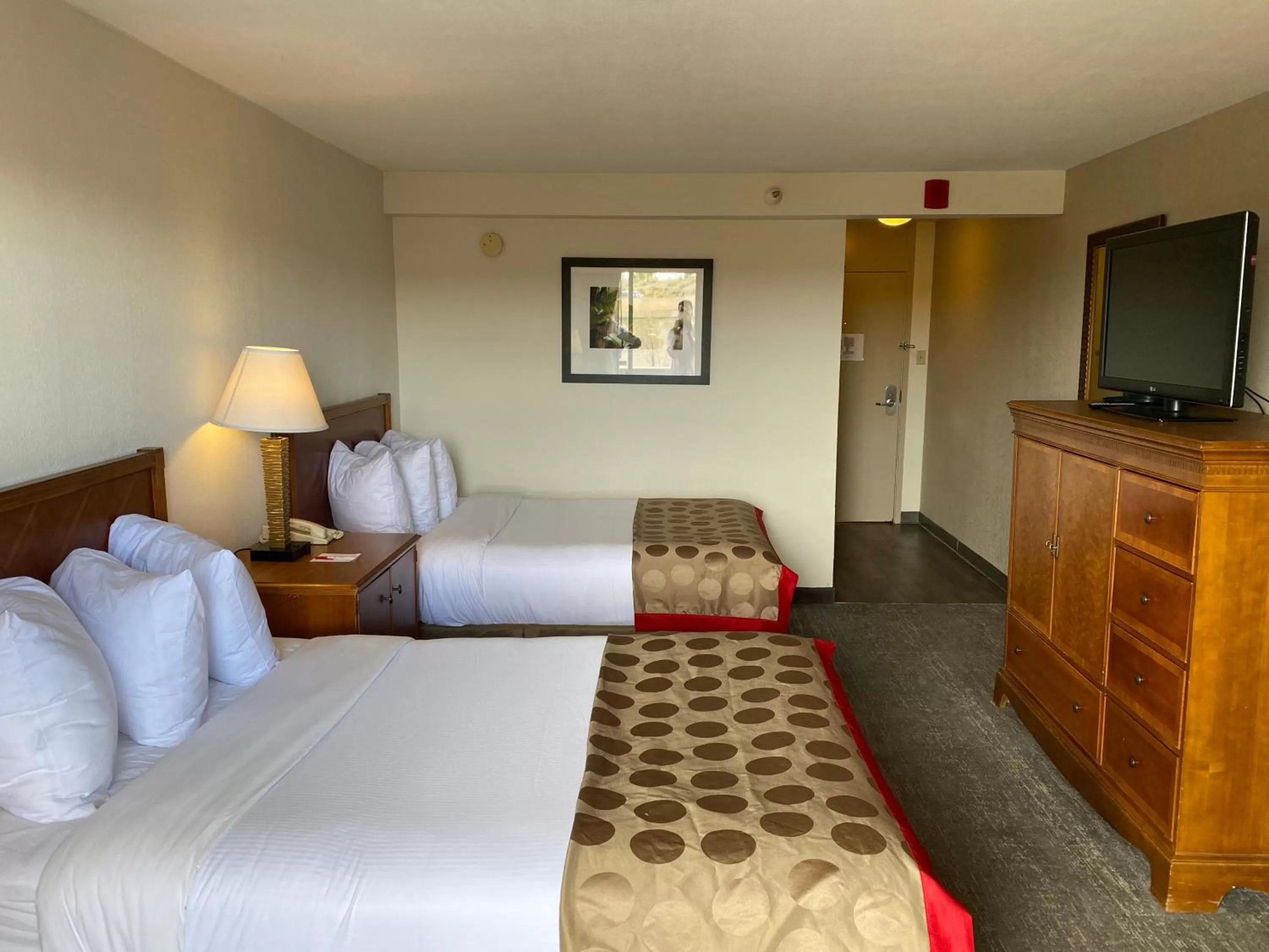 Bed in Ramada by Wyndham Albuquerque Midtown