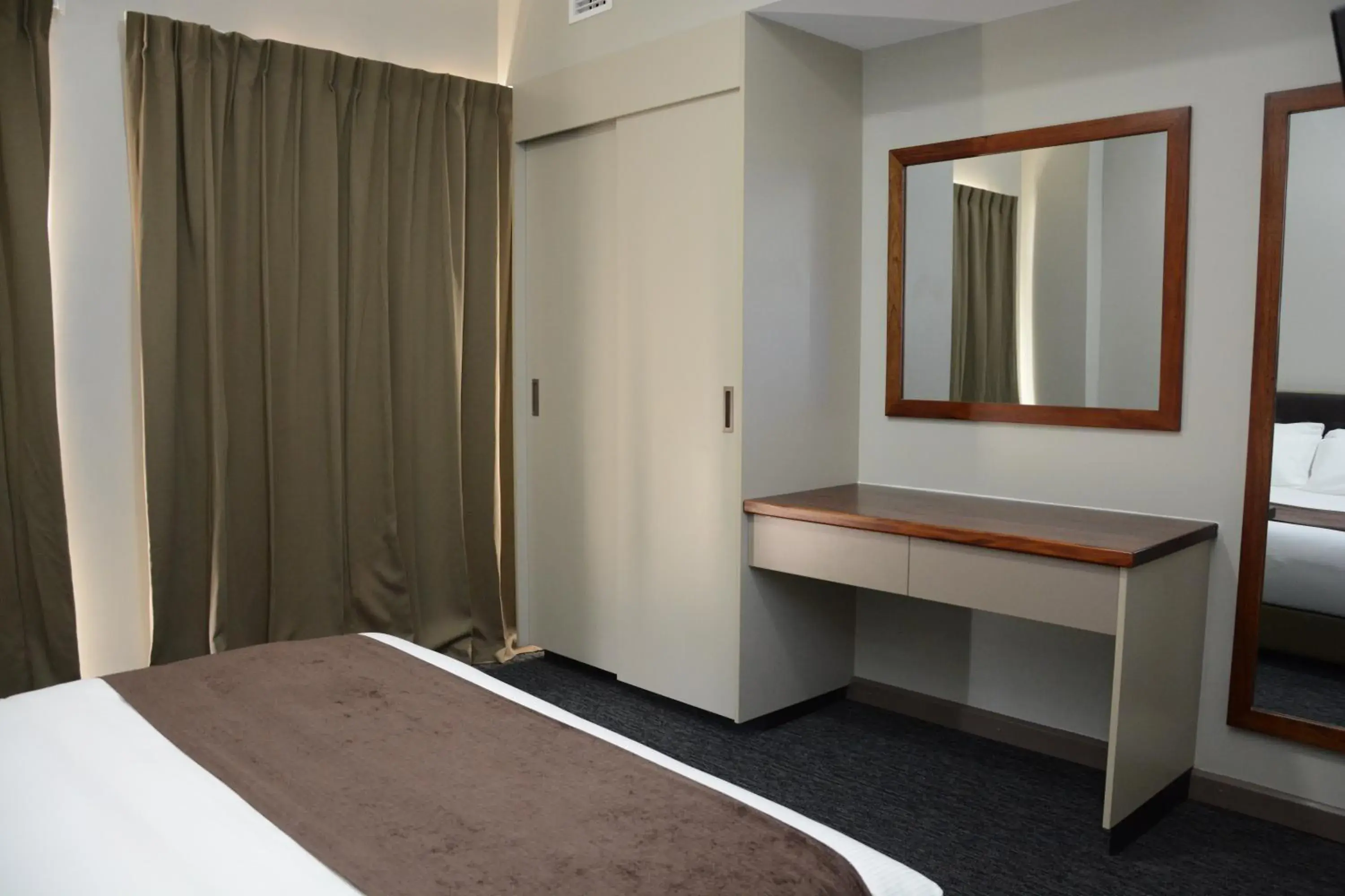 Photo of the whole room, Bed in Ratsun Nadi Airport Apartment Hotel