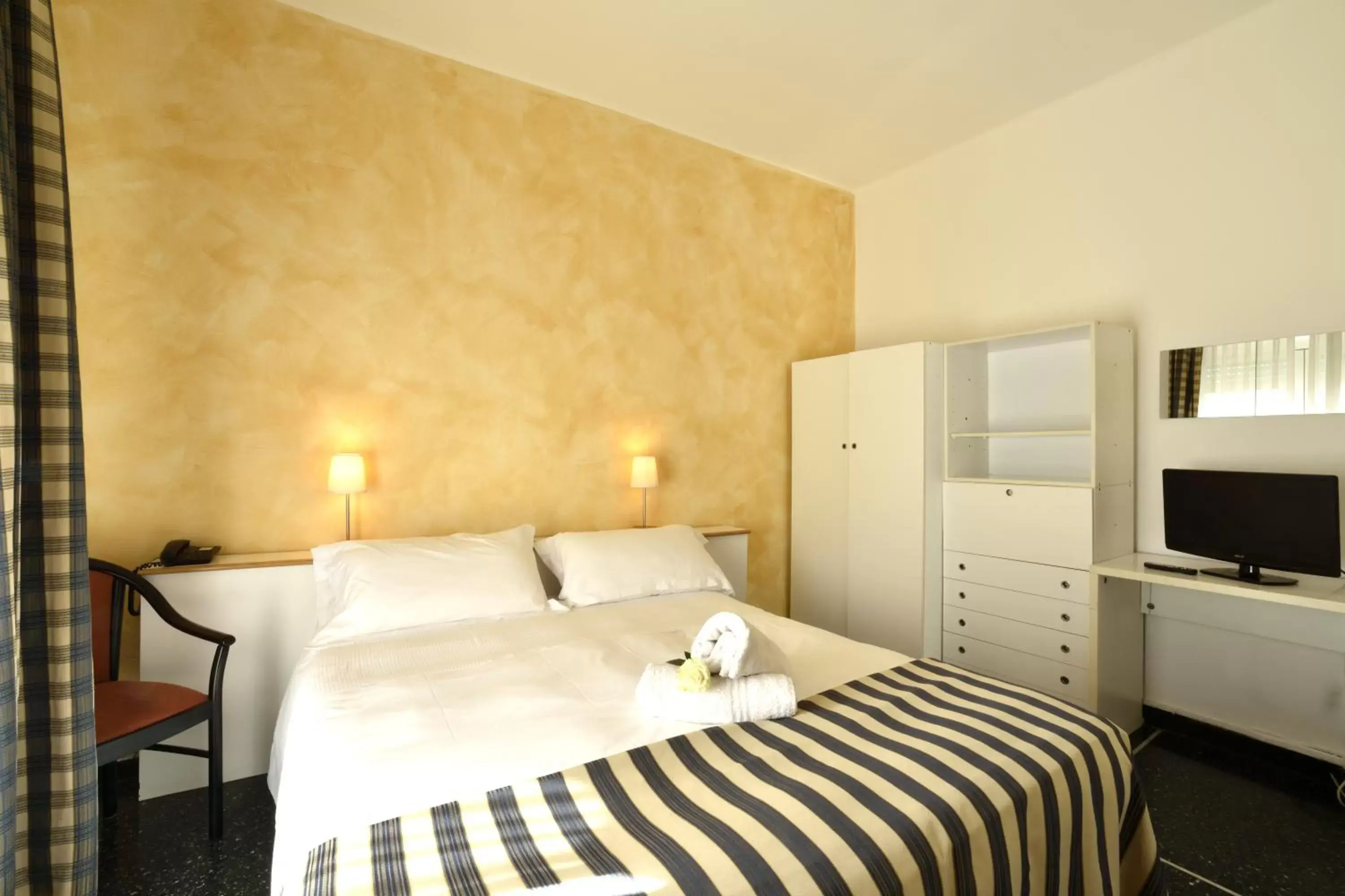 Photo of the whole room, Bed in Hotel Morchio Mhotelsgroup