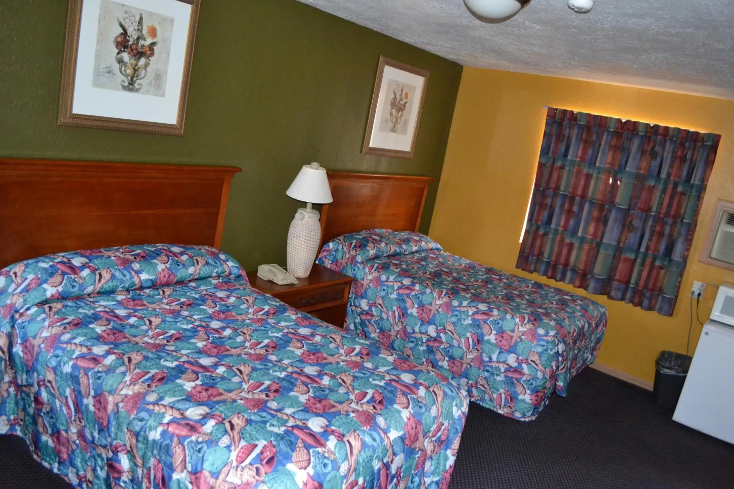 Bed in Atlantic Economy Inn