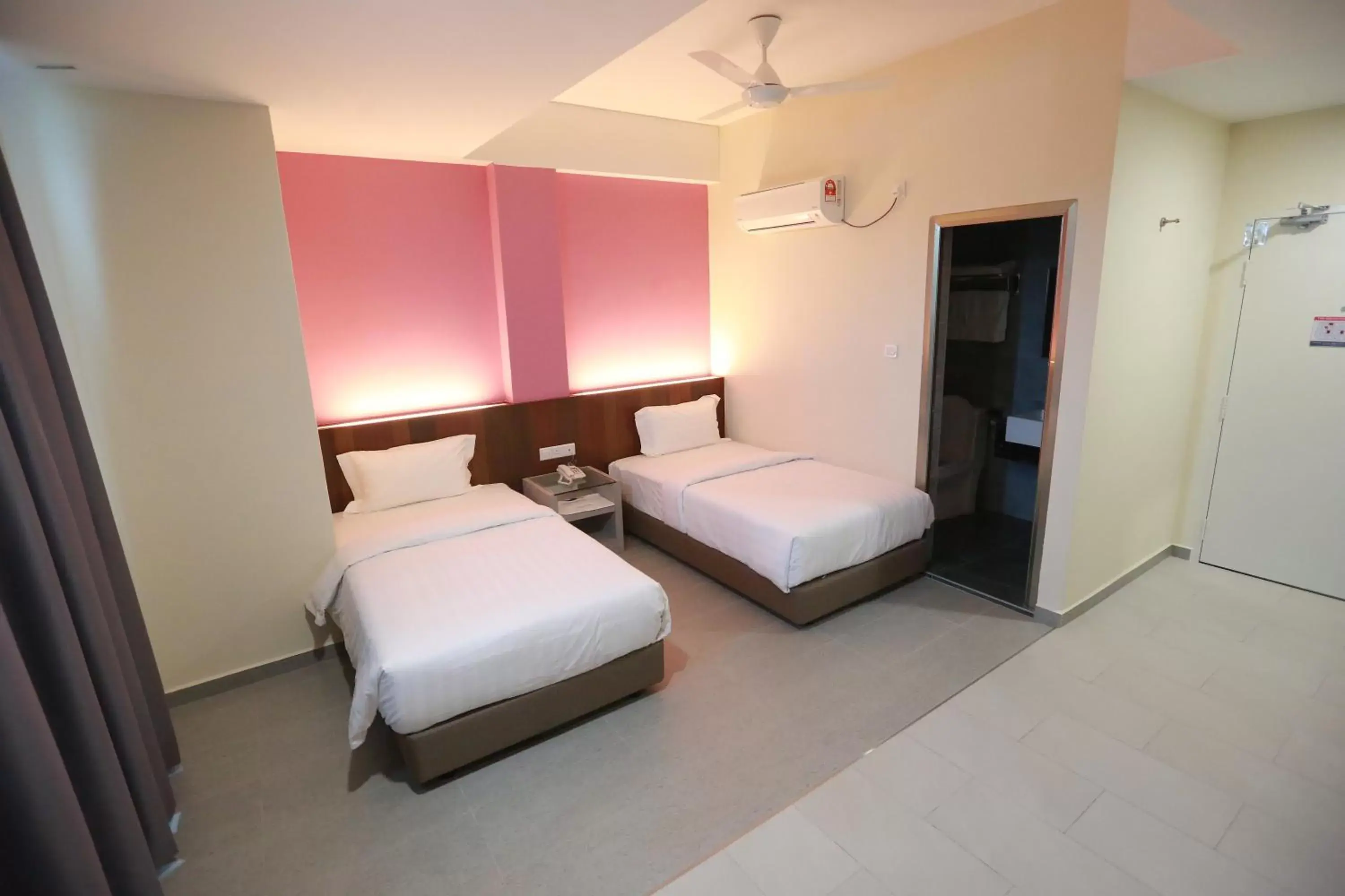 Bed in Pantai Regal Hotel Bed in Pantai Regal Hotel