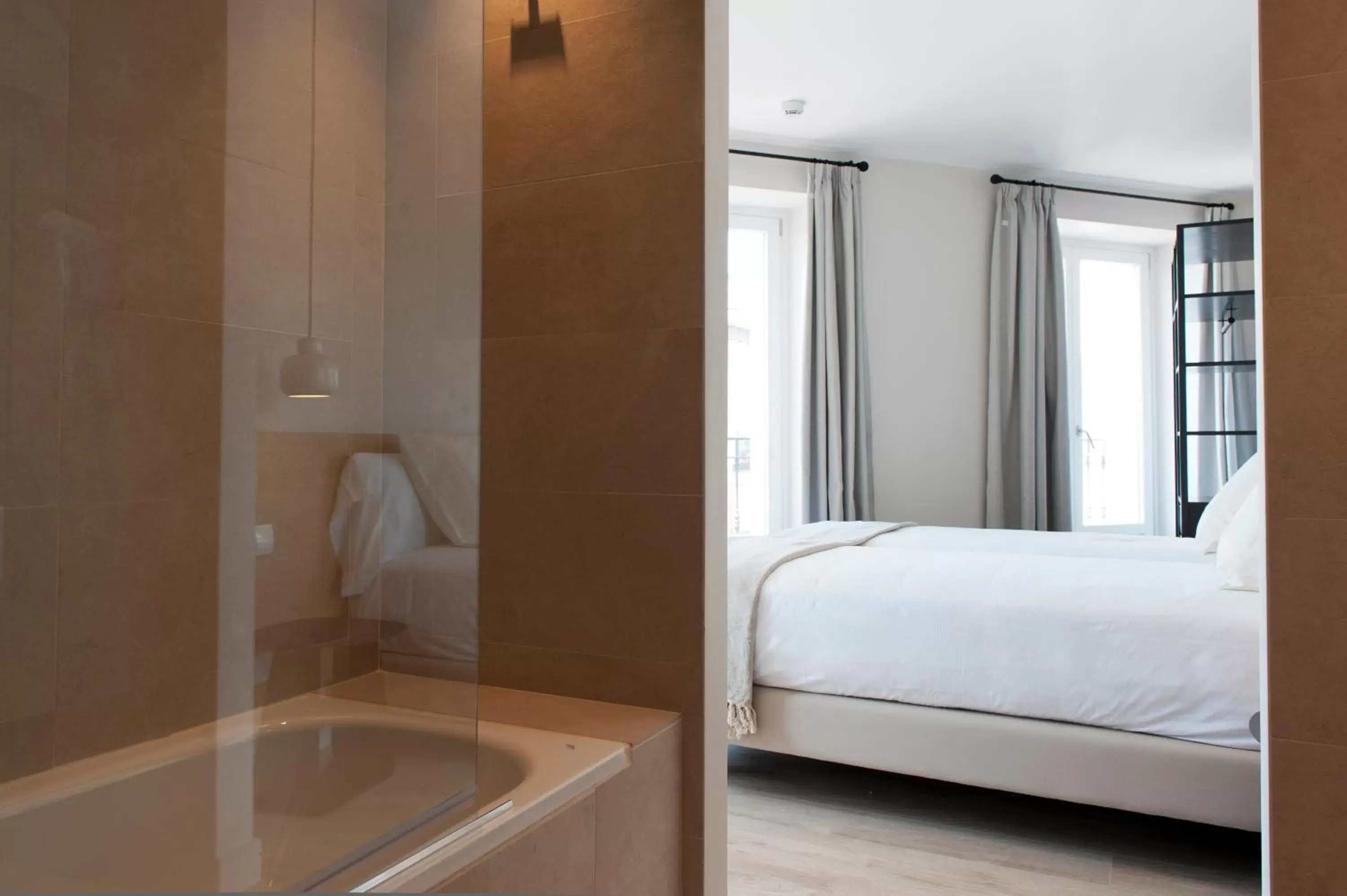 Bedroom, Bathroom in MH Apartments Central Madrid