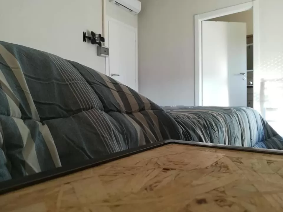 Photo of the whole room, Bed in LE MURA Foresteria