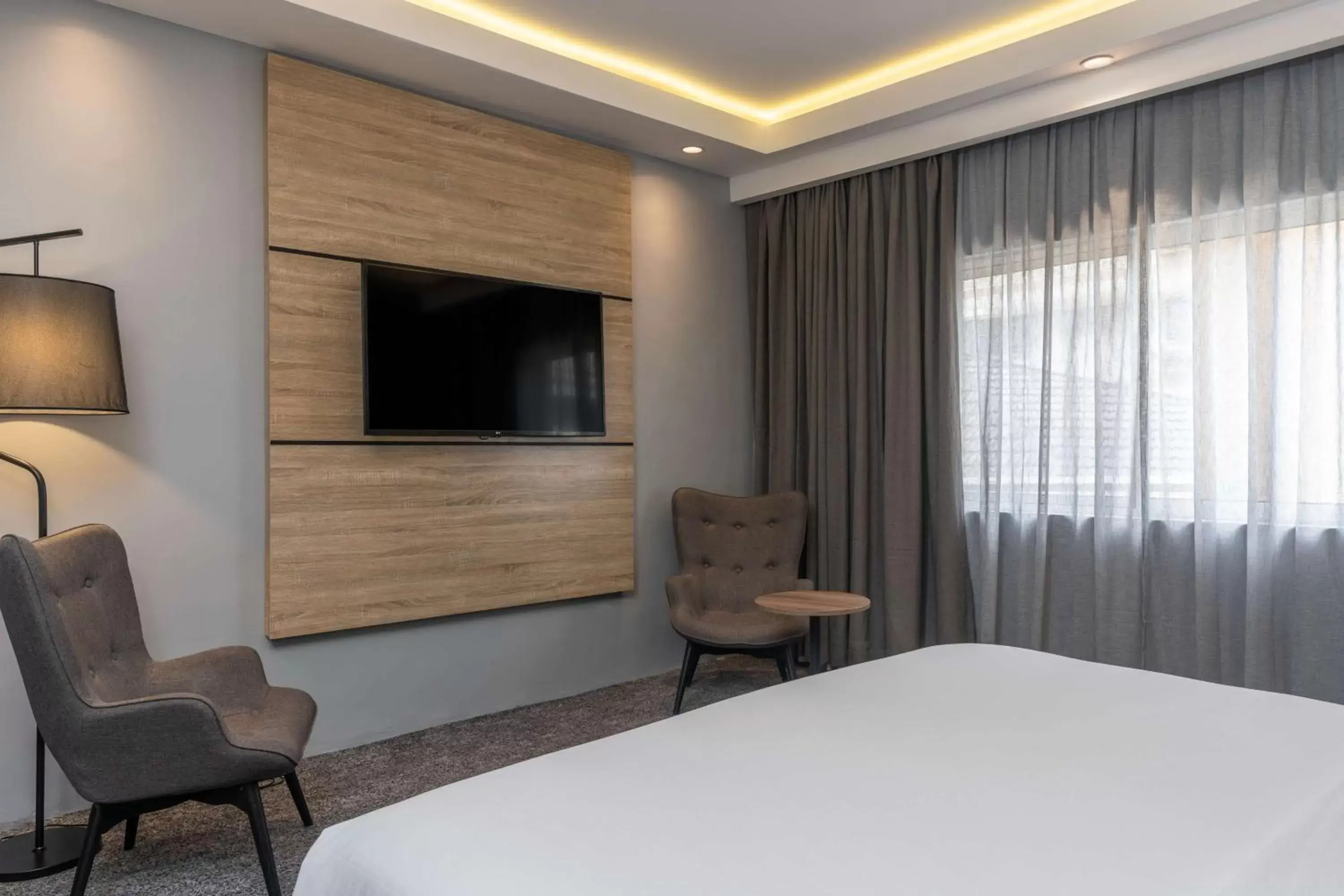 Photo of the whole room, TV/Entertainment Center in Park Inn by Radisson, Lagos Victoria Island