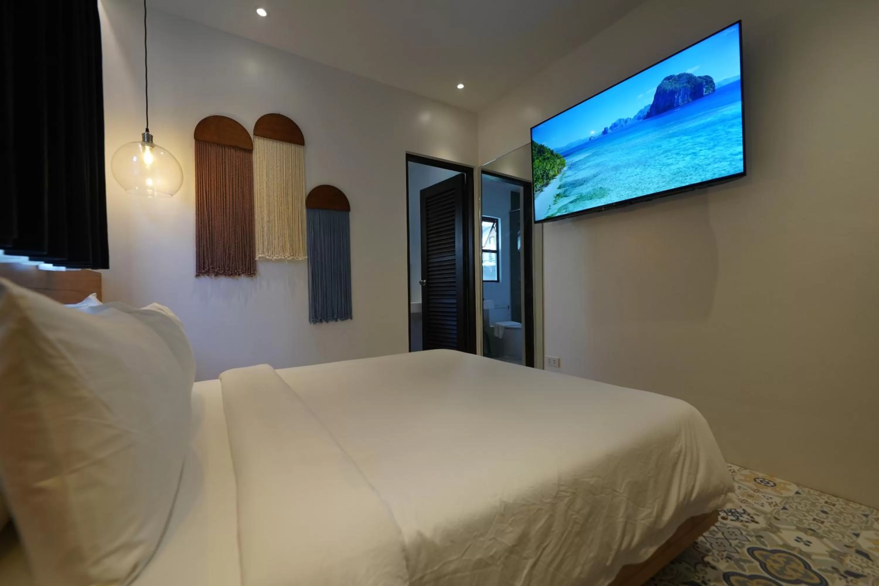 Bed in J Boutique Hotel El Nido Managed by H Hospitality Group
