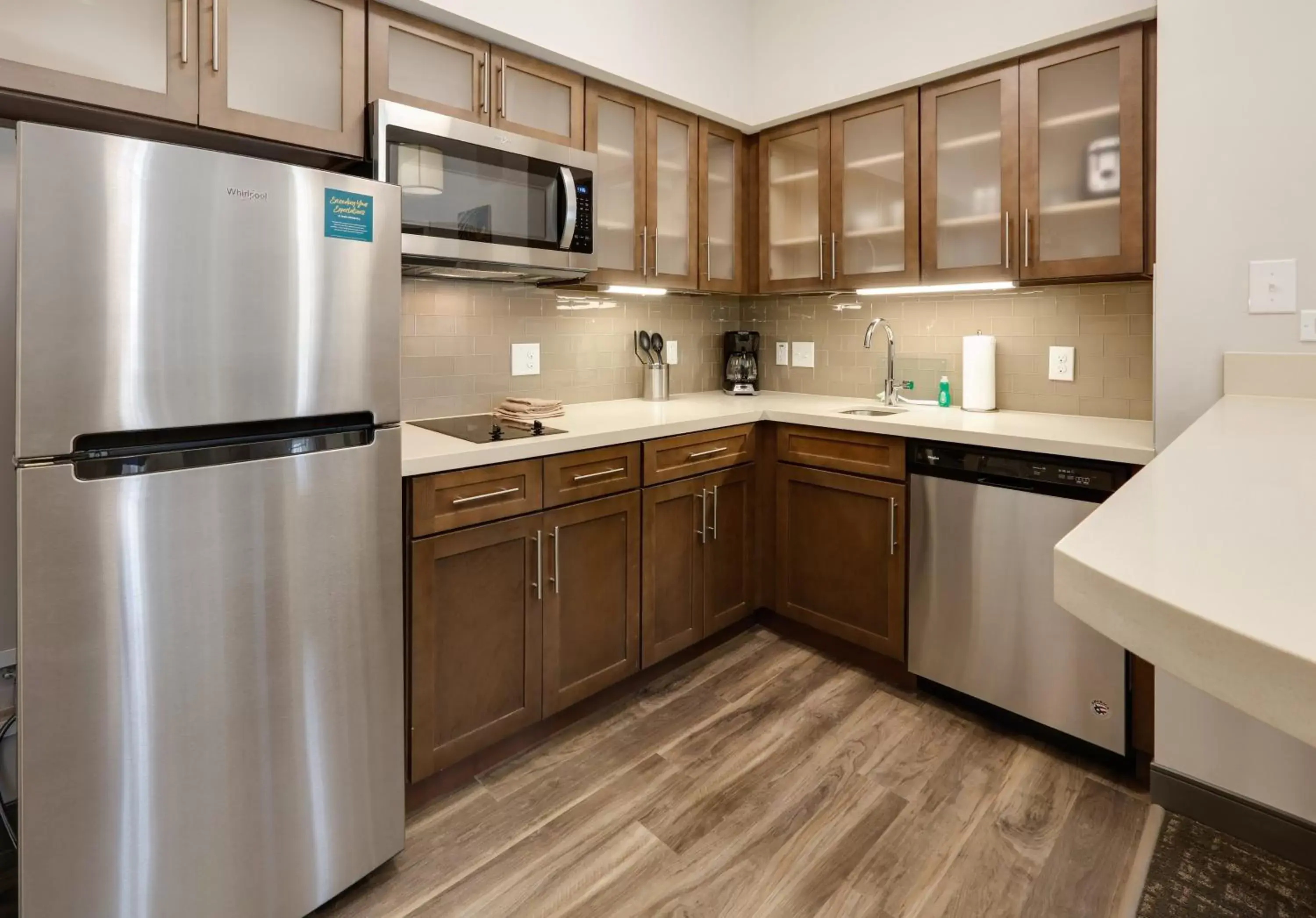 Bedroom, Kitchen/Kitchenette in Staybridge Suites - Oklahoma City - Downtown, an IHG Hotel