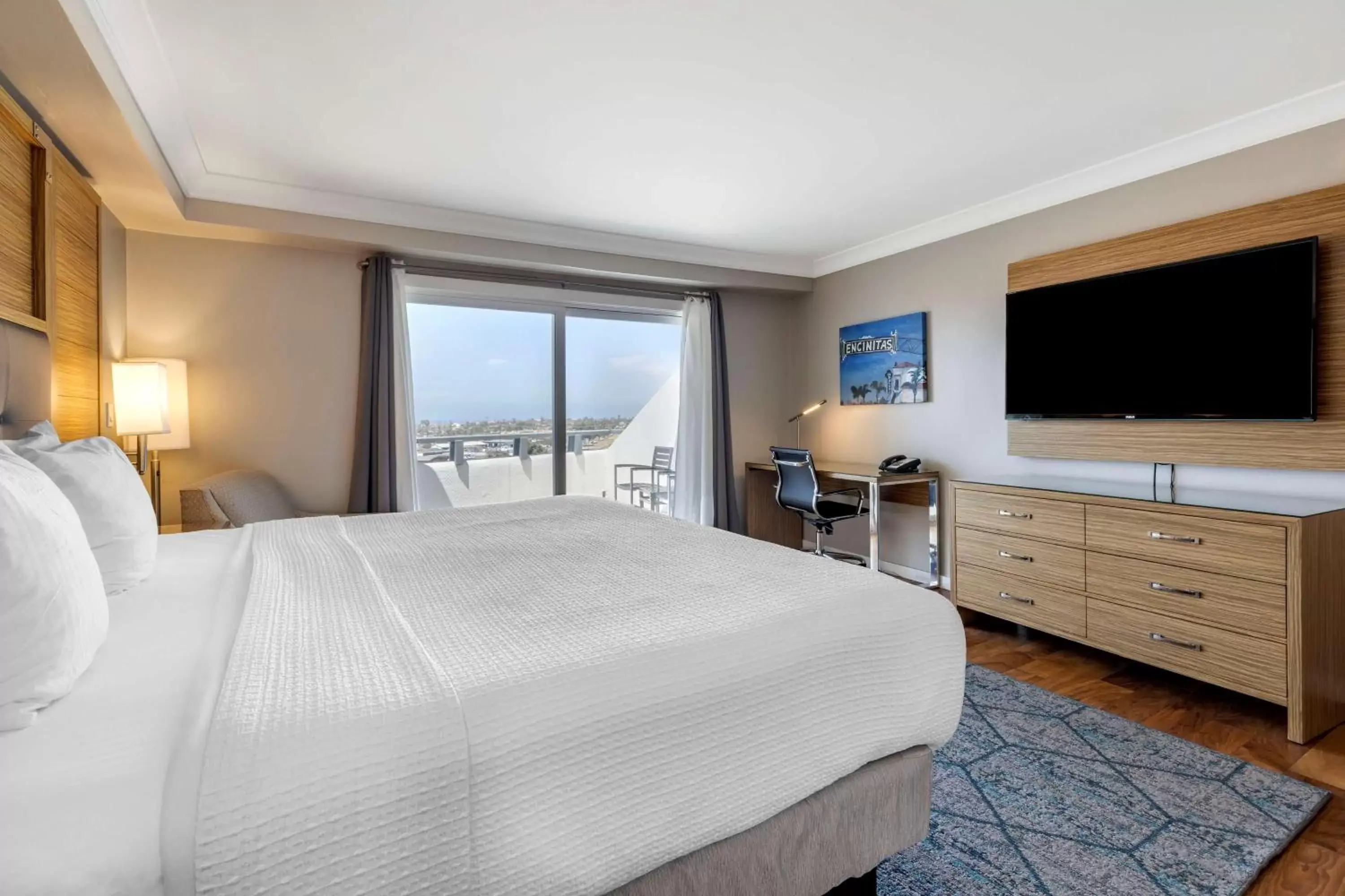 Bedroom, TV/Entertainment Center in The Encinitan Hotel & Suites