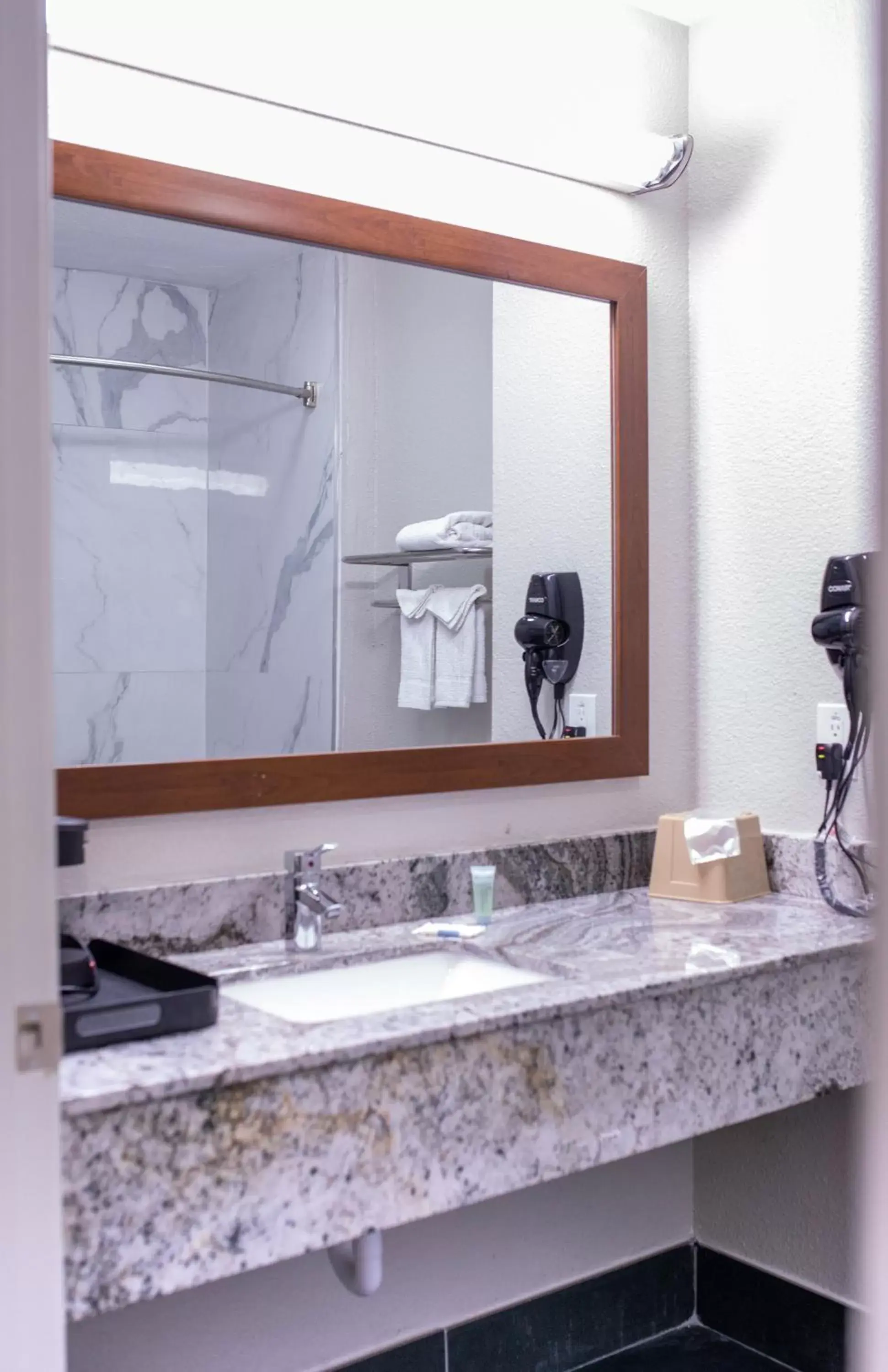 Bathroom in SureStay Plus Hotel by Best Western Ft Worth Benbrook